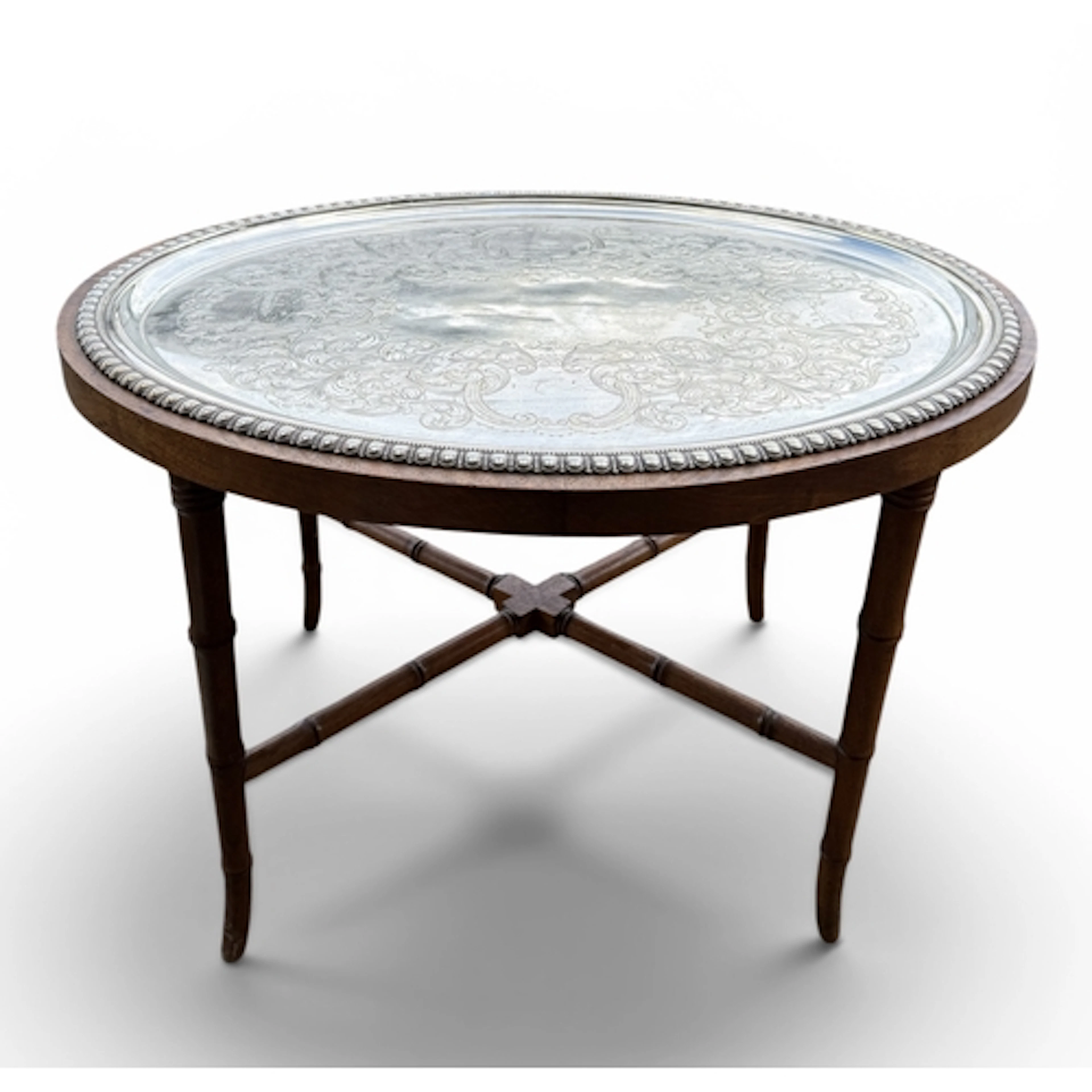 AN OVAL SILVER PLATED TRAY TOP TABLE ON FAUX BAMBOO WOODEN B...