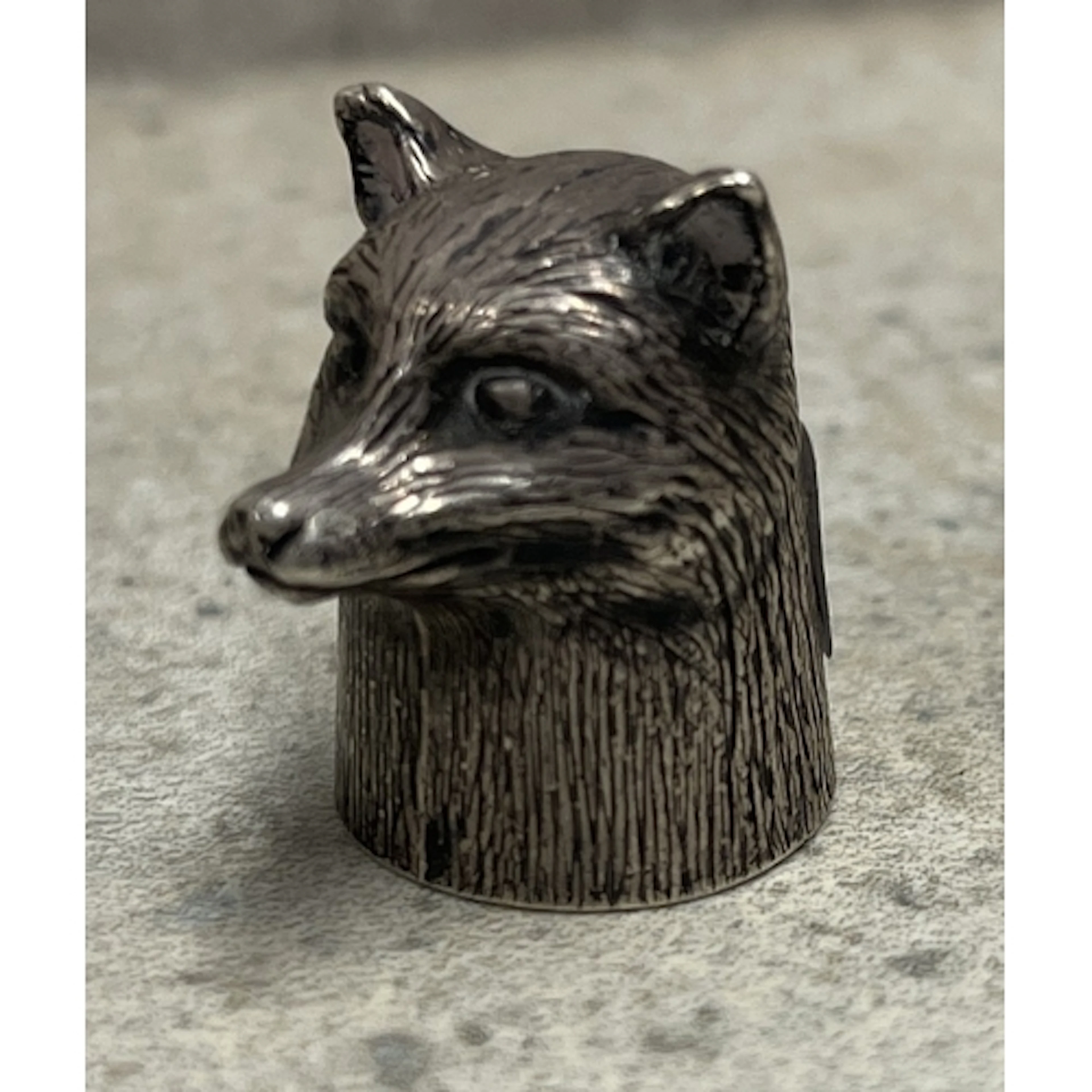 A rare English hallmarked modernist silver toy stirrup cup i...
