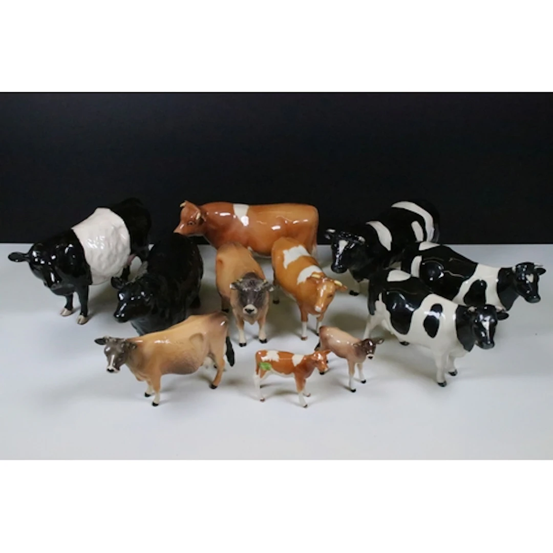 Group of twelve Beswick cow figures, to comprise CH examples...