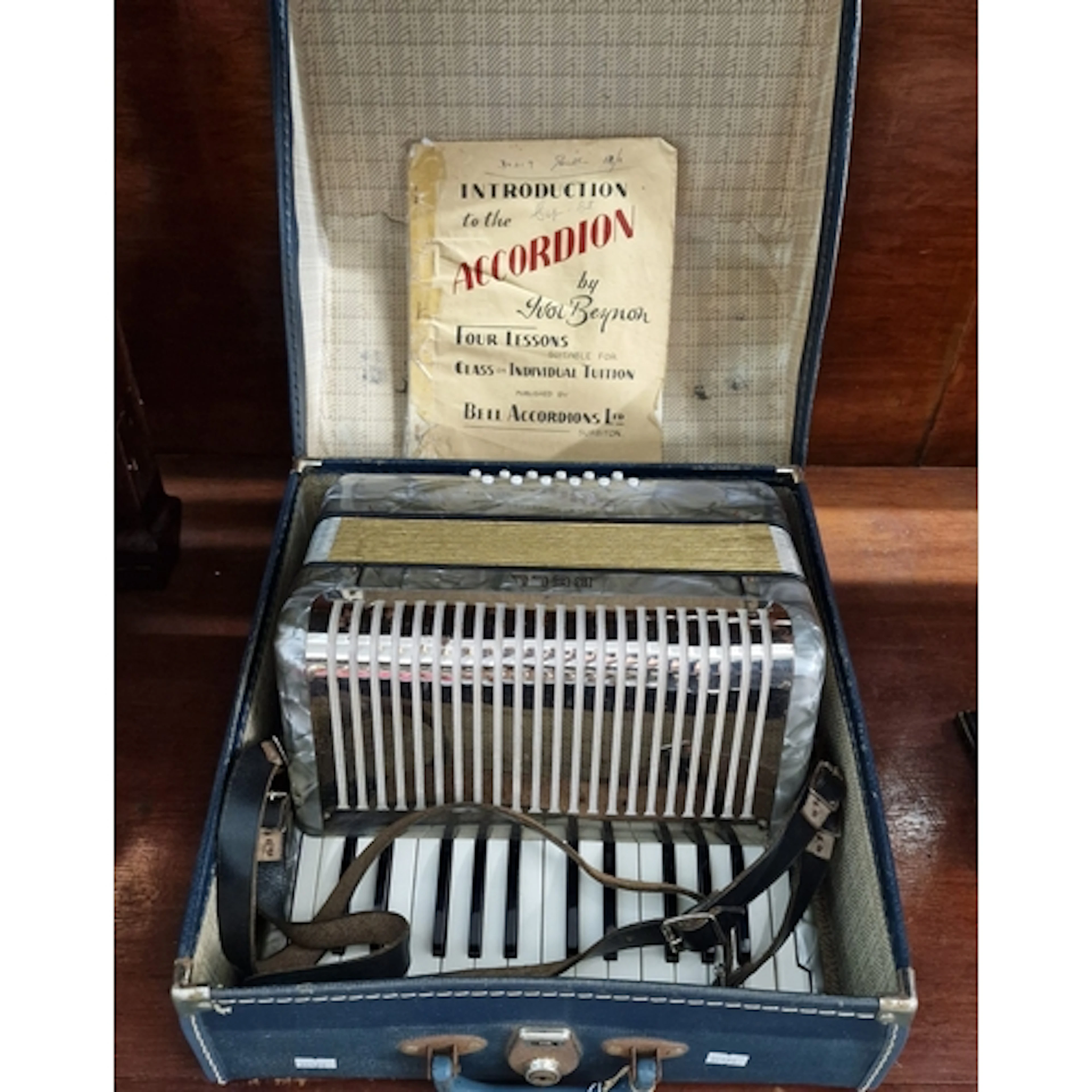 Vintage 'Bell' mother of pearl accordion in fitted case. (B....