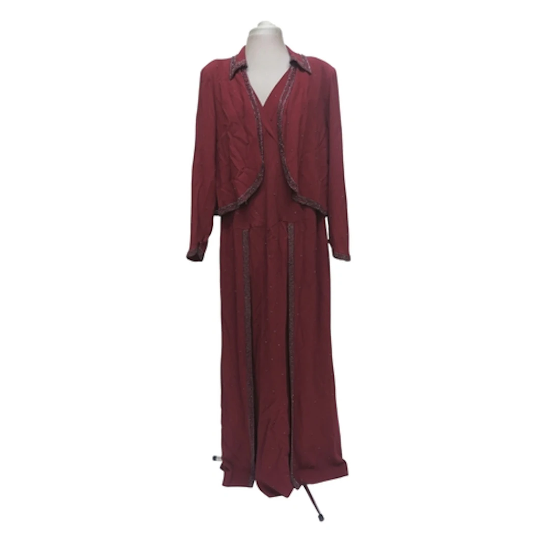 A 1940s ladies evening ensemble comprising a burgundy crepe ...
