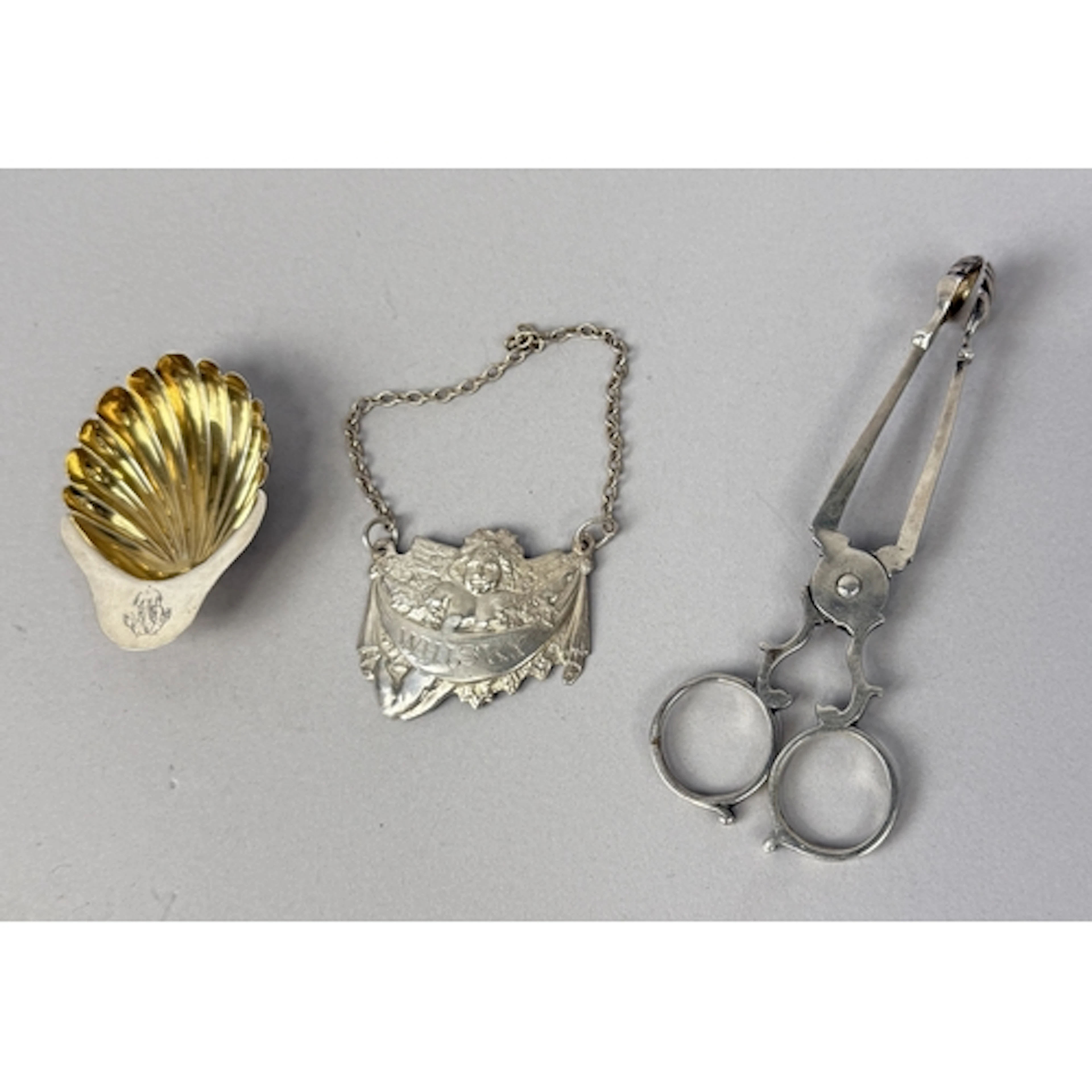 SILVER TO INCLUDE TONGS, SHELL DISH, WHISKEY LABEL Total wei...