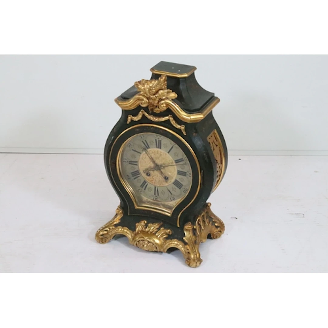 20th century Louis XV style mantel clock, the case having bl...