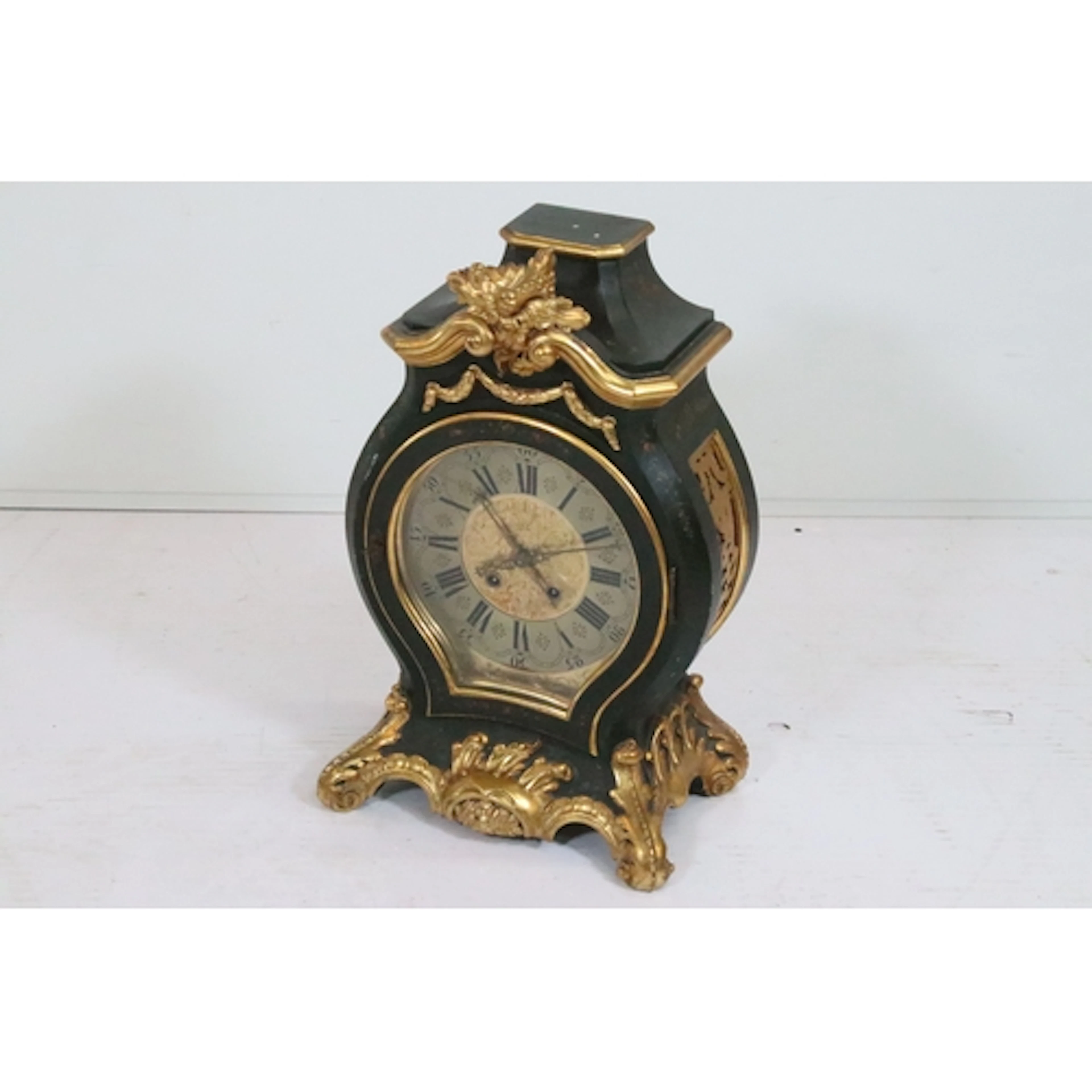 20th century Louis XV style mantel clock, the case having bl...