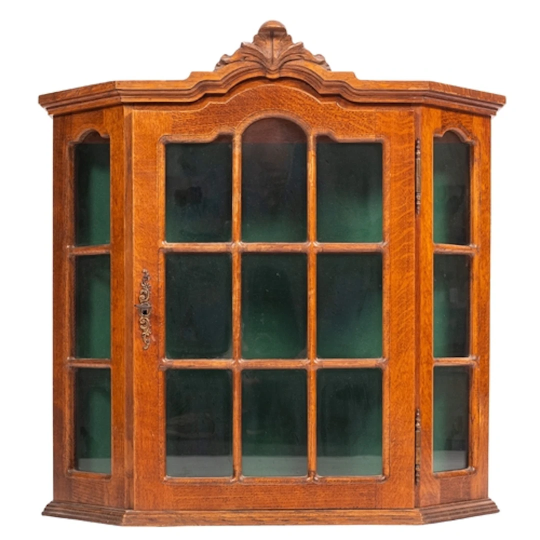 An oak and glazed wall-hanging display cabinet in George III...