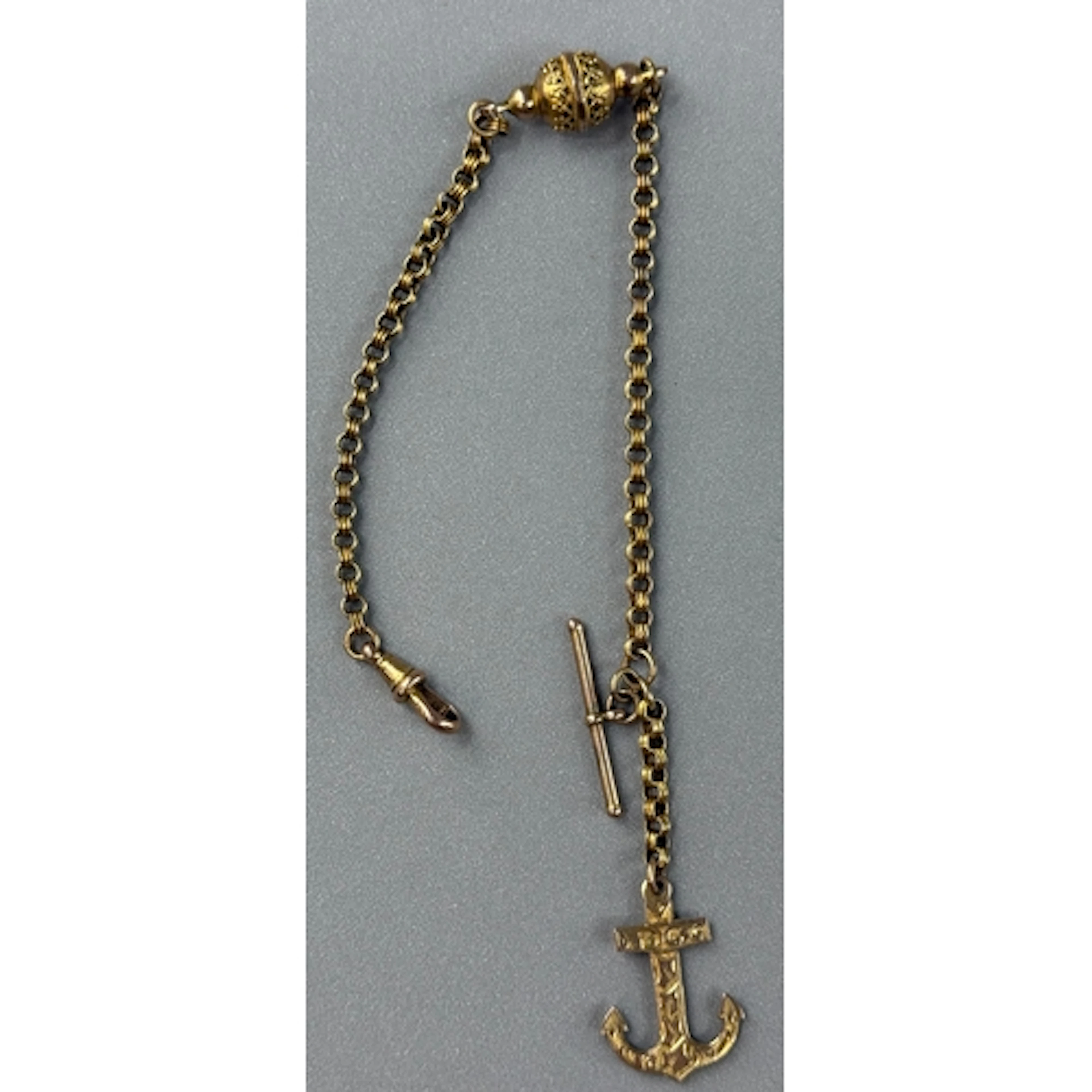 Jewellery: a ladies yellow metal Albertina watch chain, test...