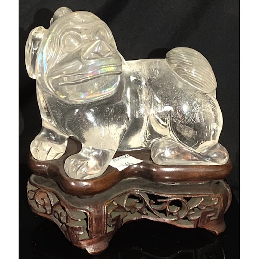 A Chinese 20th century Rock crystal carving of a temple dogs...