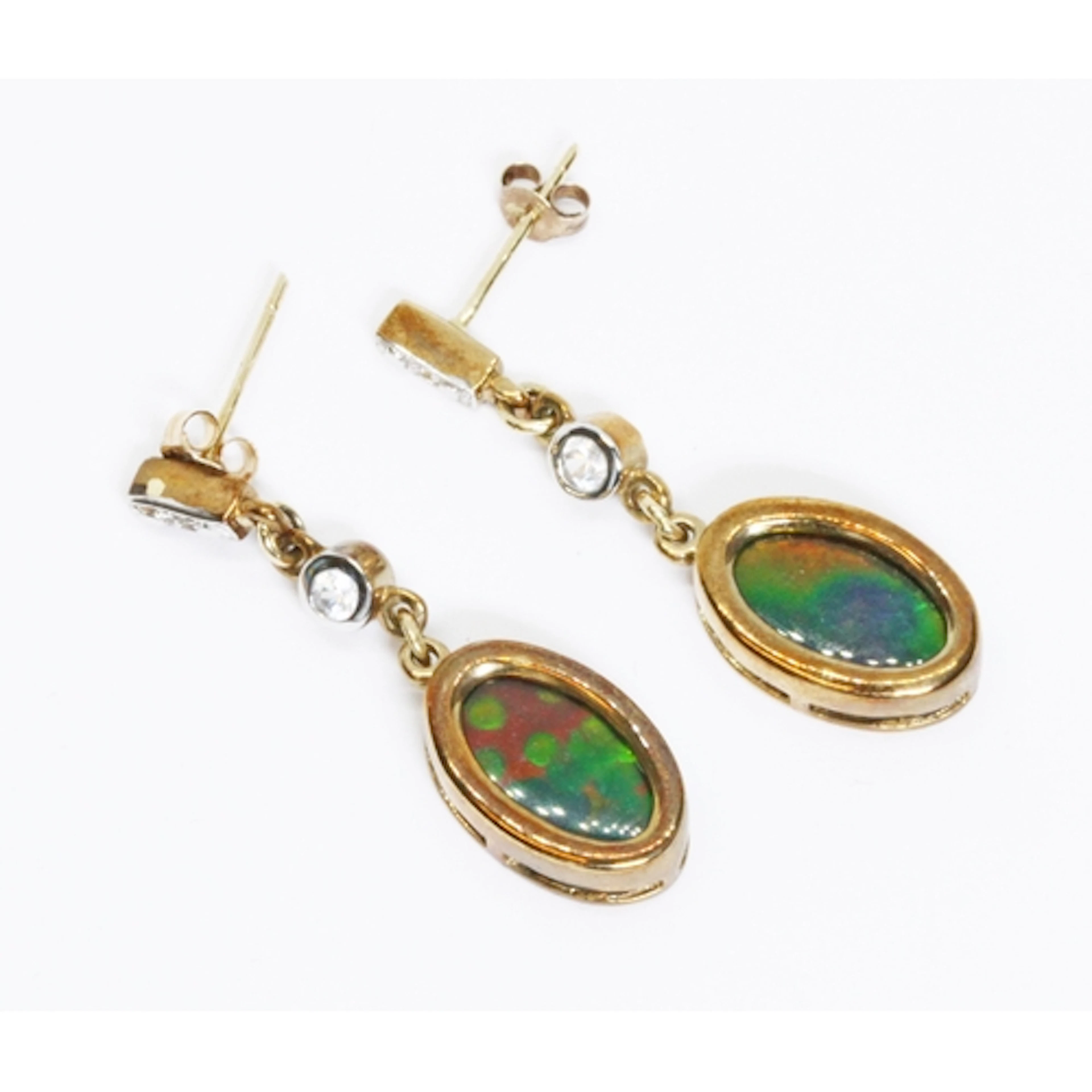 A pair of hallmarked 9ct gold ammonite triplet and colourles...