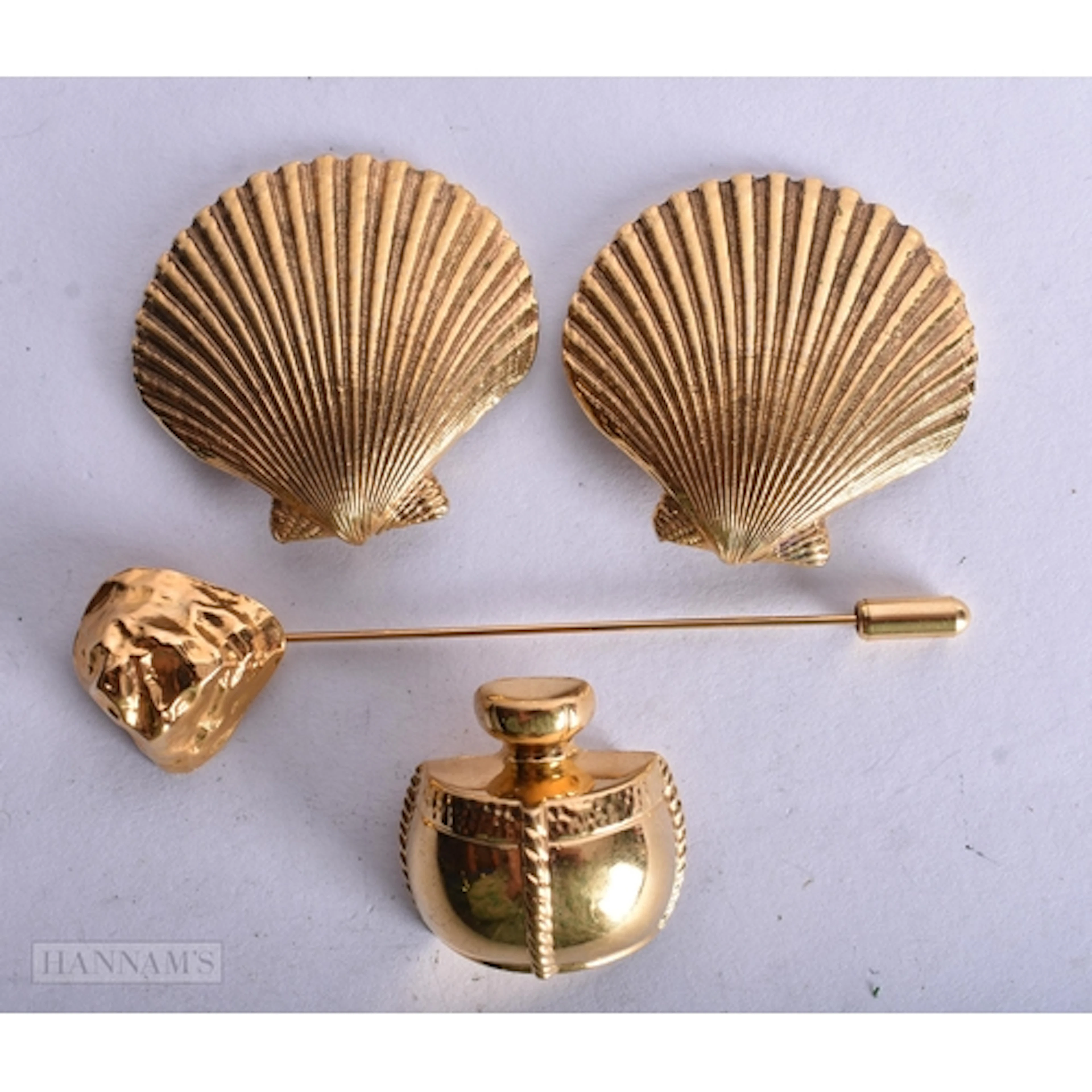 Collection of Yves Saint Laurent Jewellery inc. Brooch, Clip...