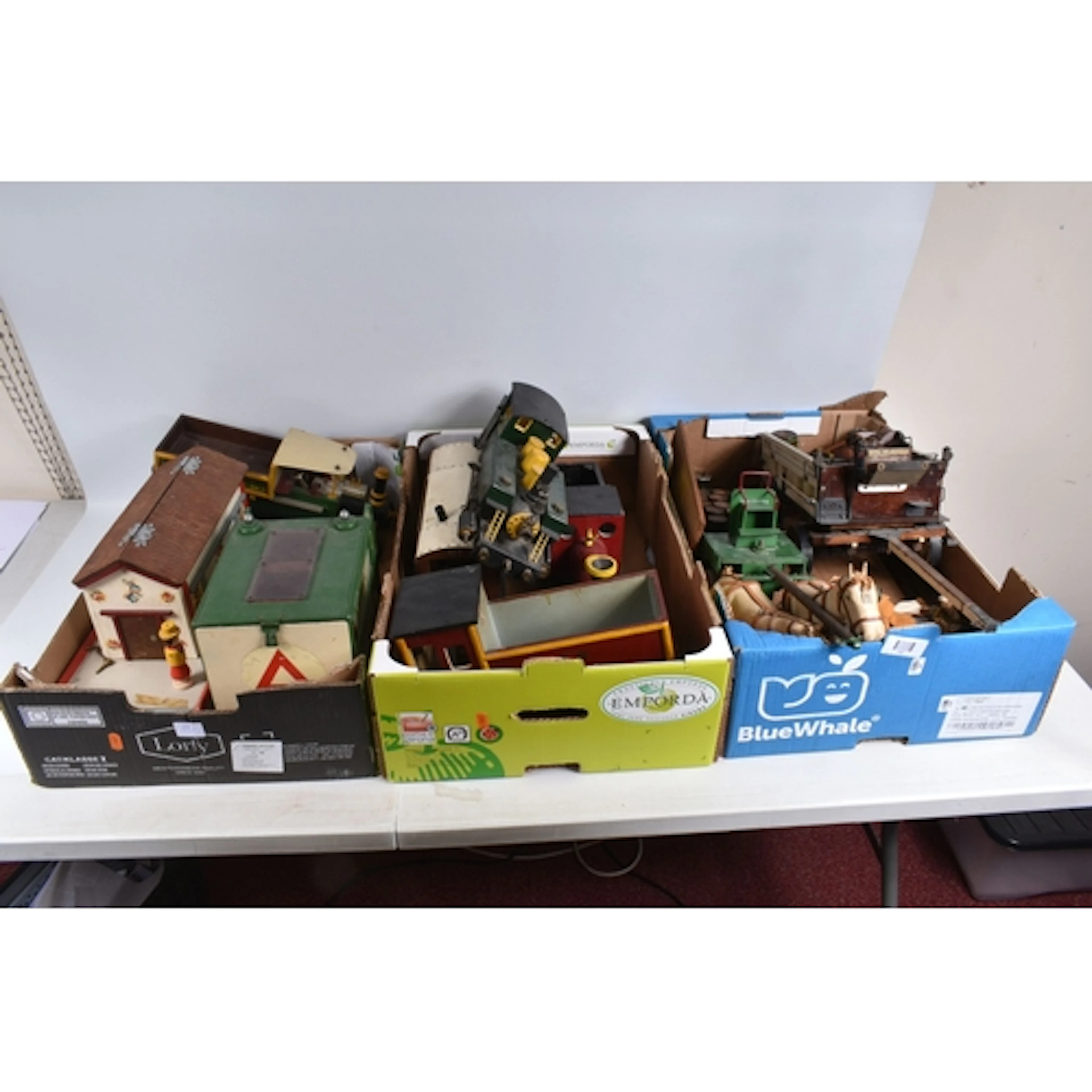 THREE BOXES OF SCRATCH WOODEN AND METAL LOCOMOTIVES, TRUCKS,...