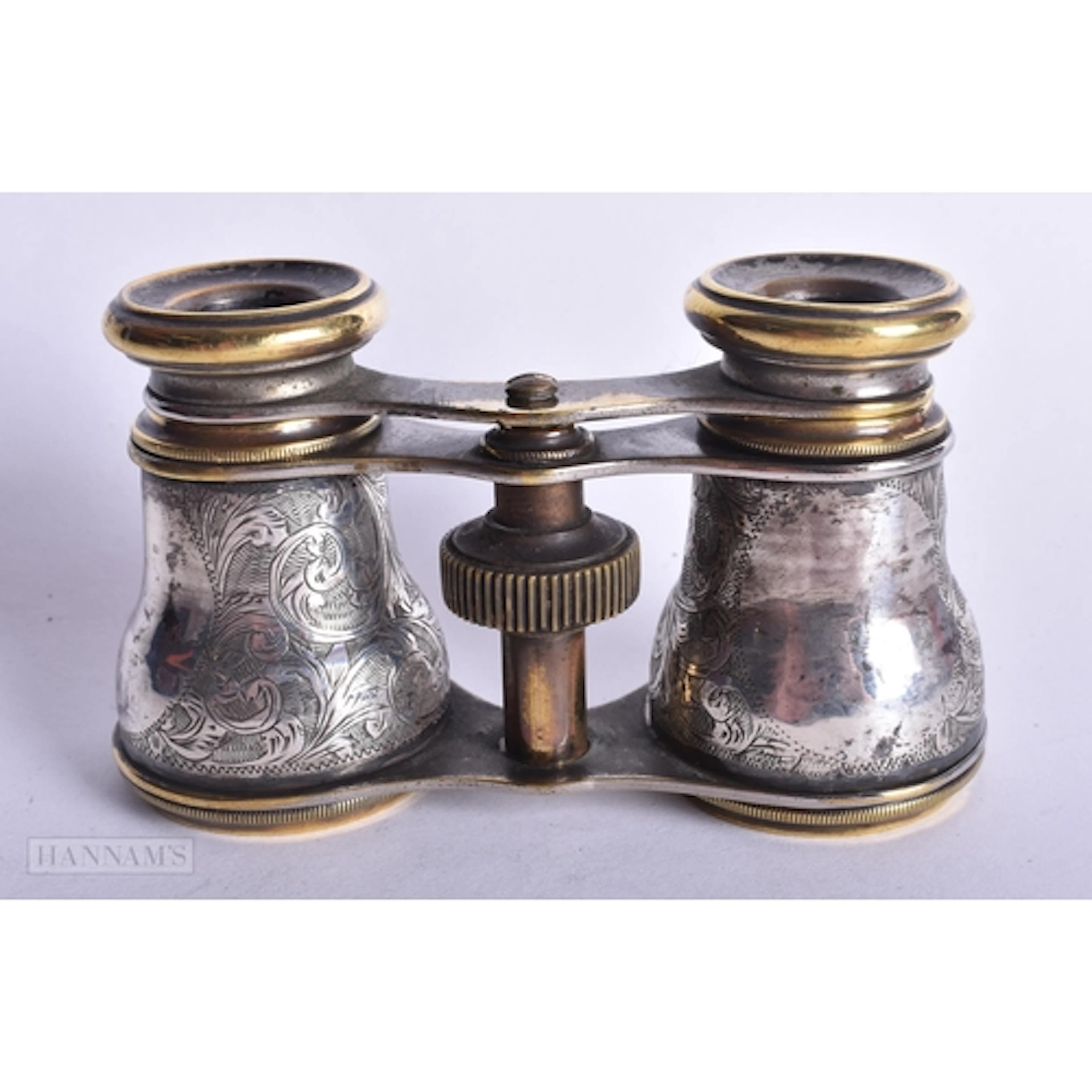 A PAIR OF SILVER OVERLAID OPERA GLASSES. 12 cm x 10 cm.