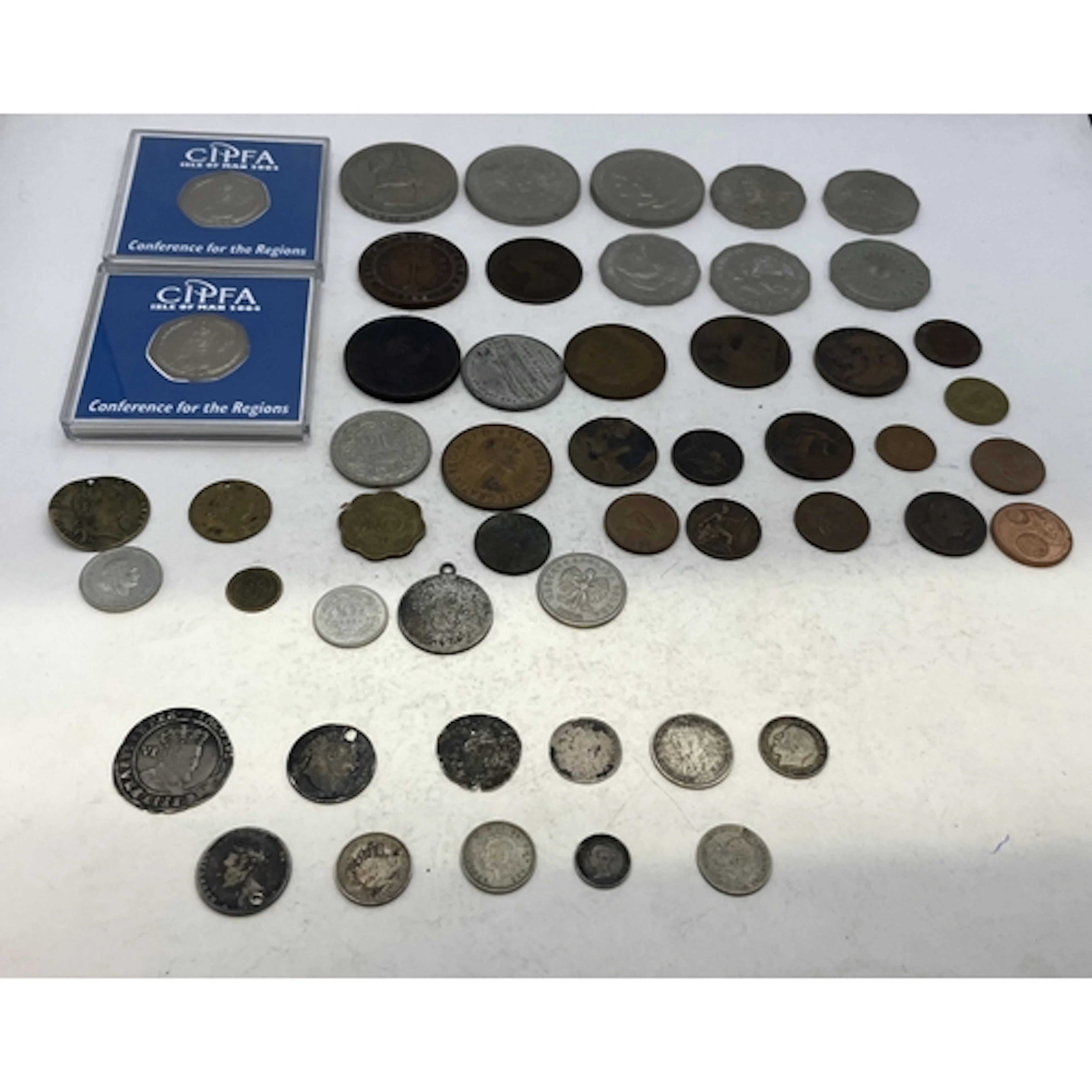 A collection of mixed coins to include Crowns, Ceylon Five C...