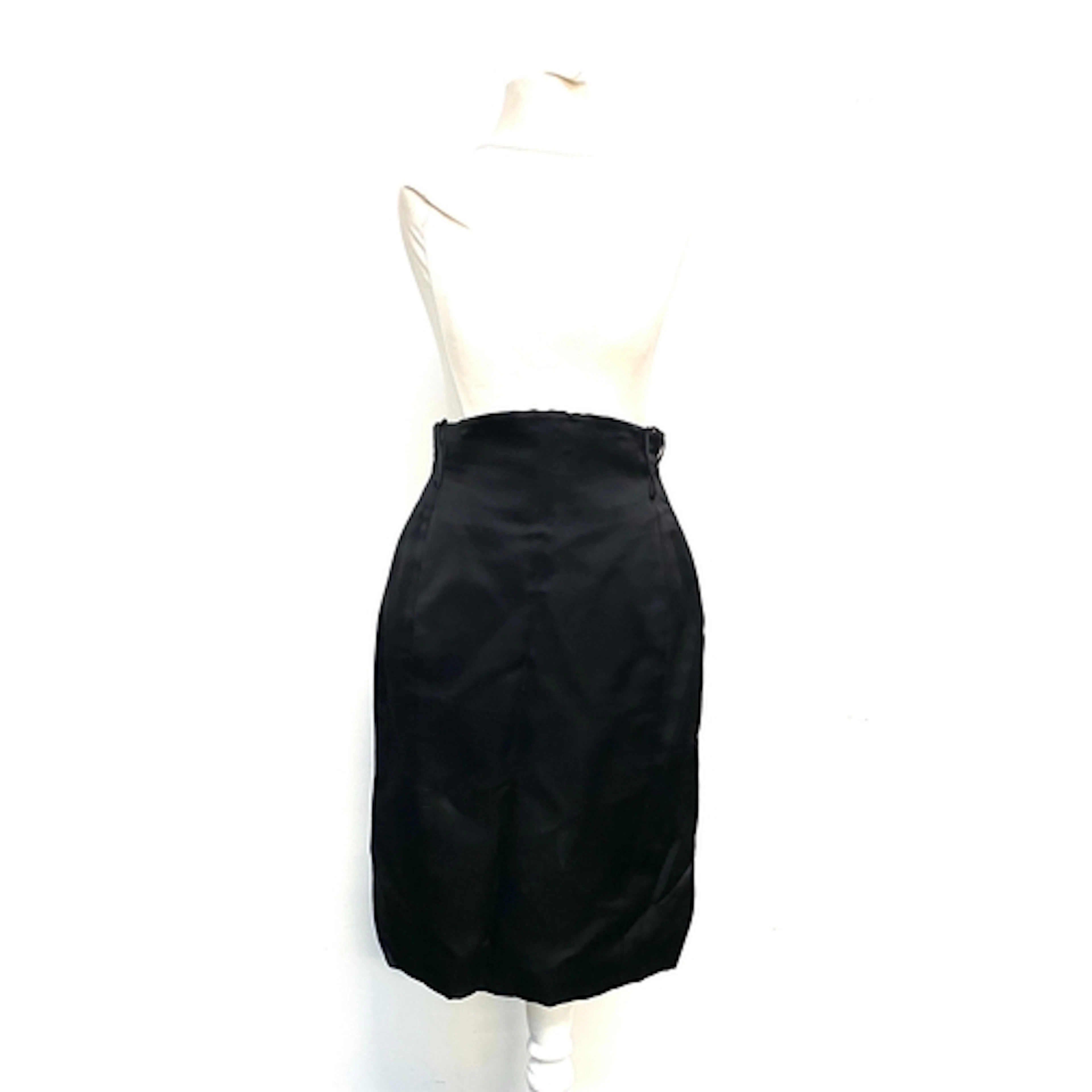 Two Catherine Walker for Chelsea Design Co. skirts, one navy...