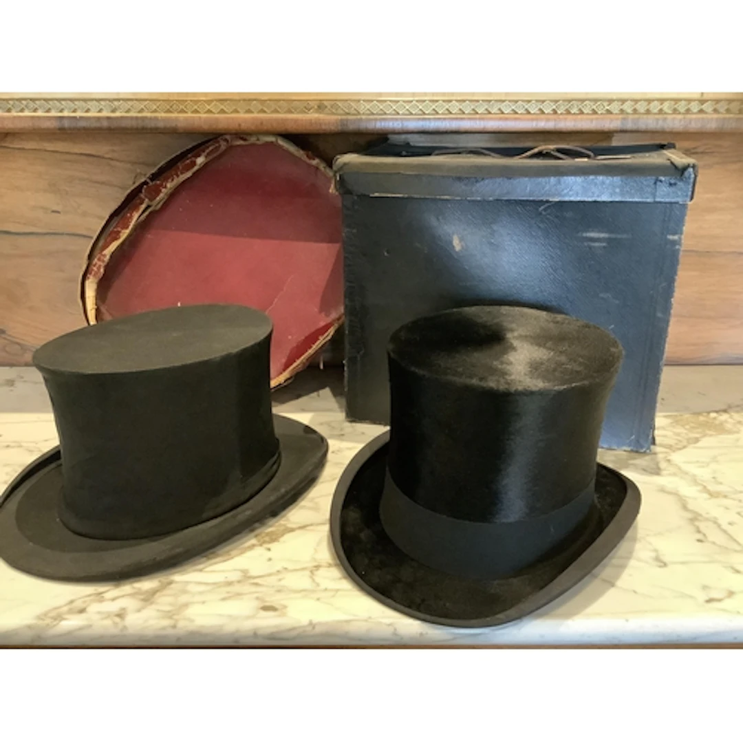 An early 20th century gentleman's collapsible black silk top...