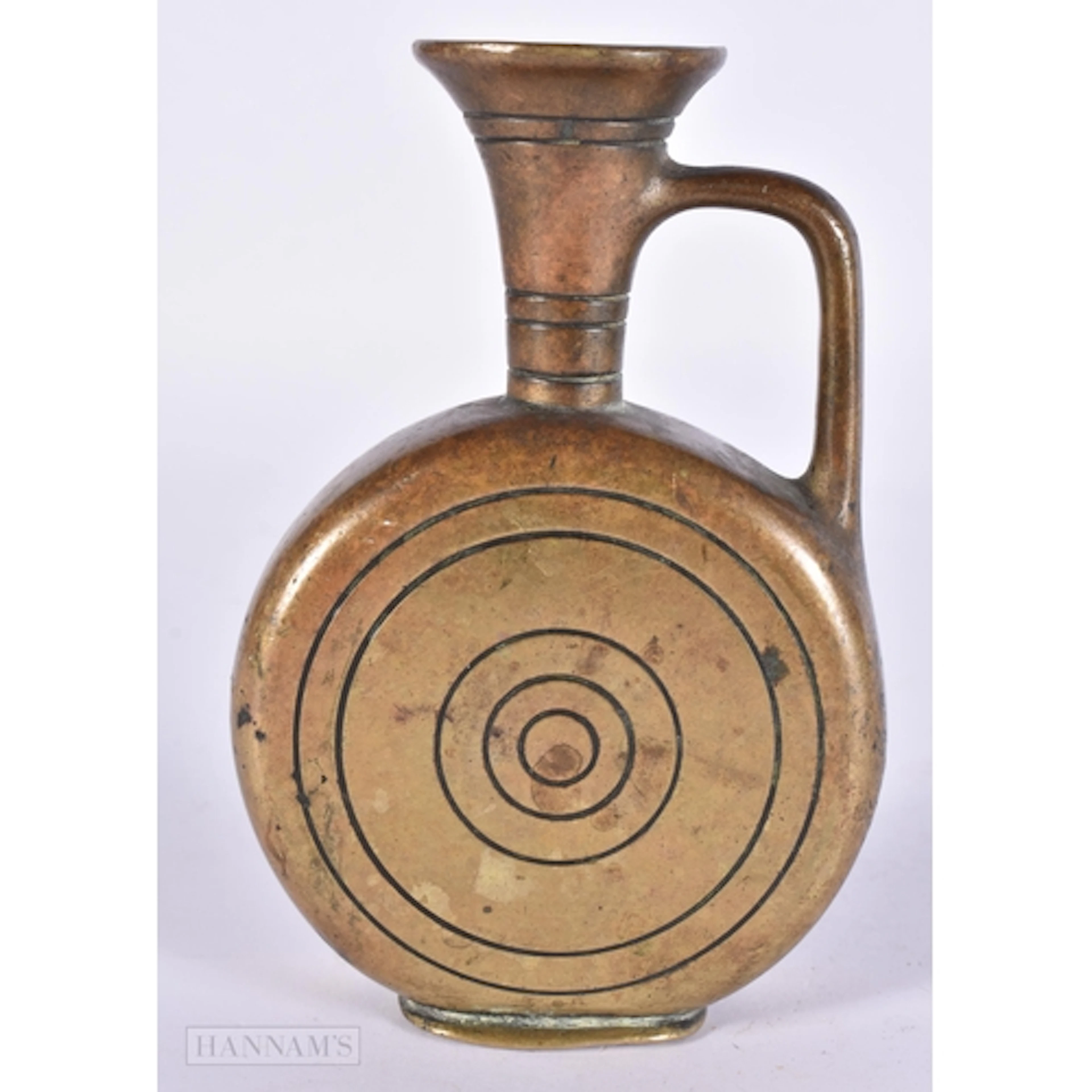 AN EARLY BRONZE SPIRAL DESIGN JUG After the Antiquity. 13 cm...