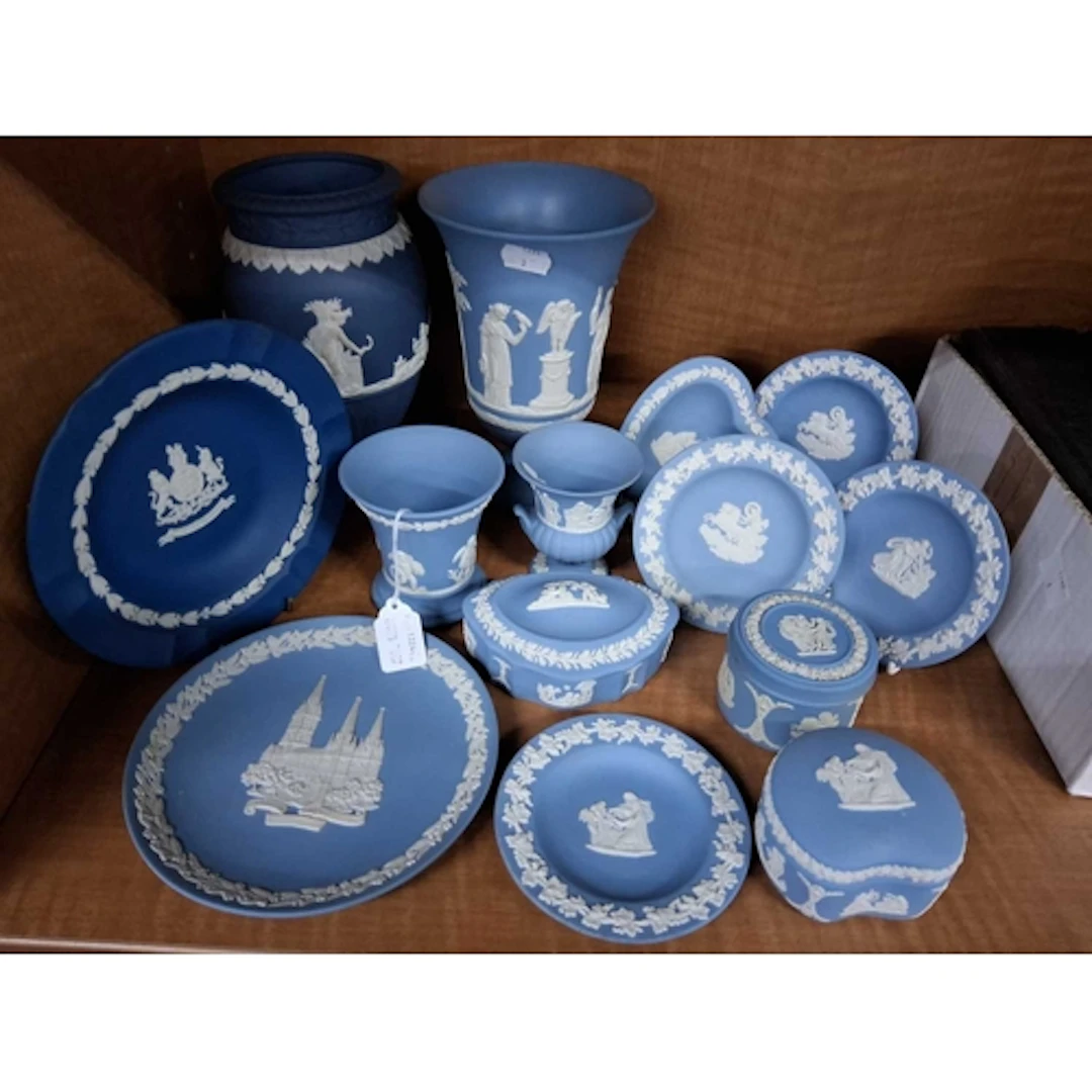 A GROUP OF WEDGWOOD JASPERWARE comprising two pieces of Port...