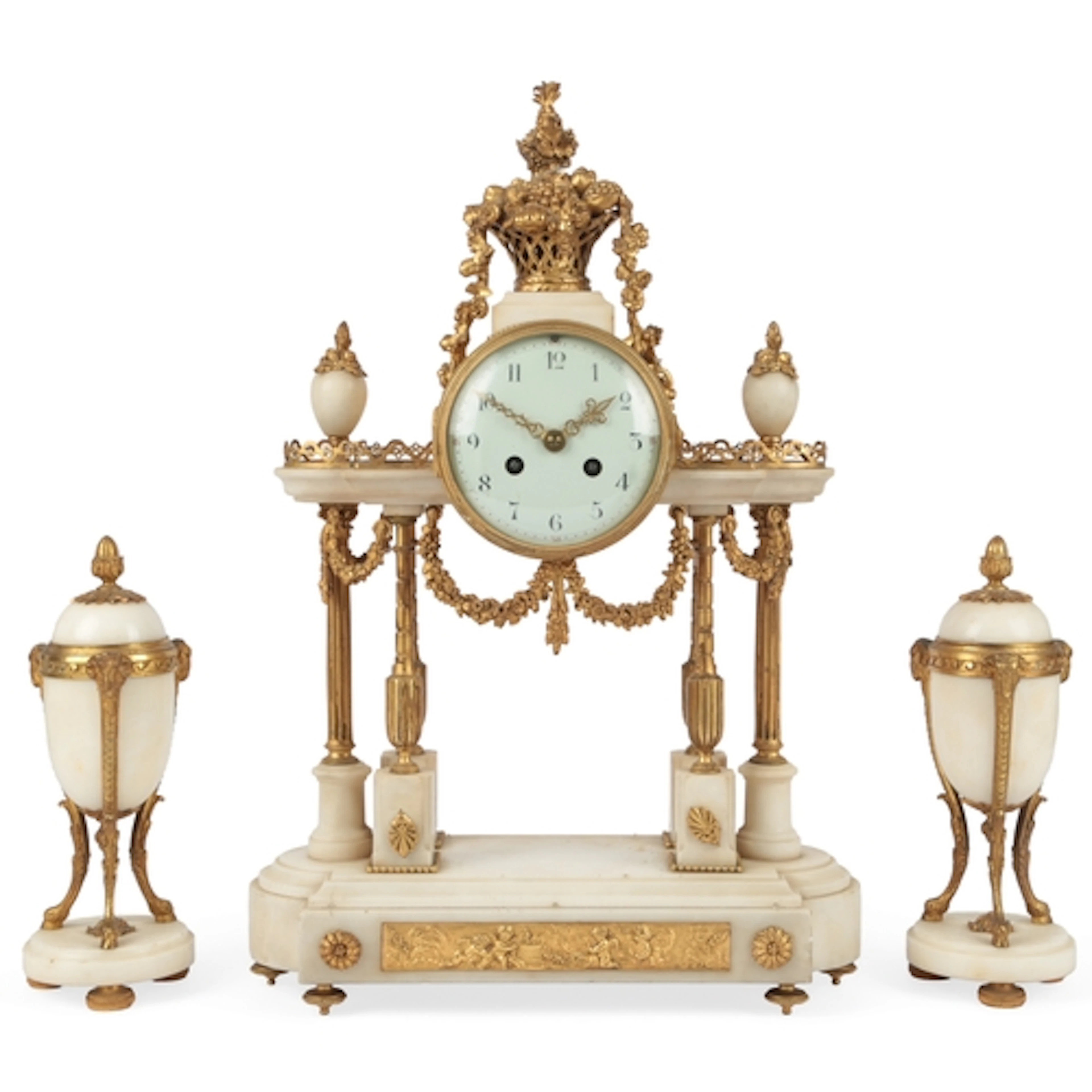 A Louis XVI style white marble and ormolu mounted three piec...