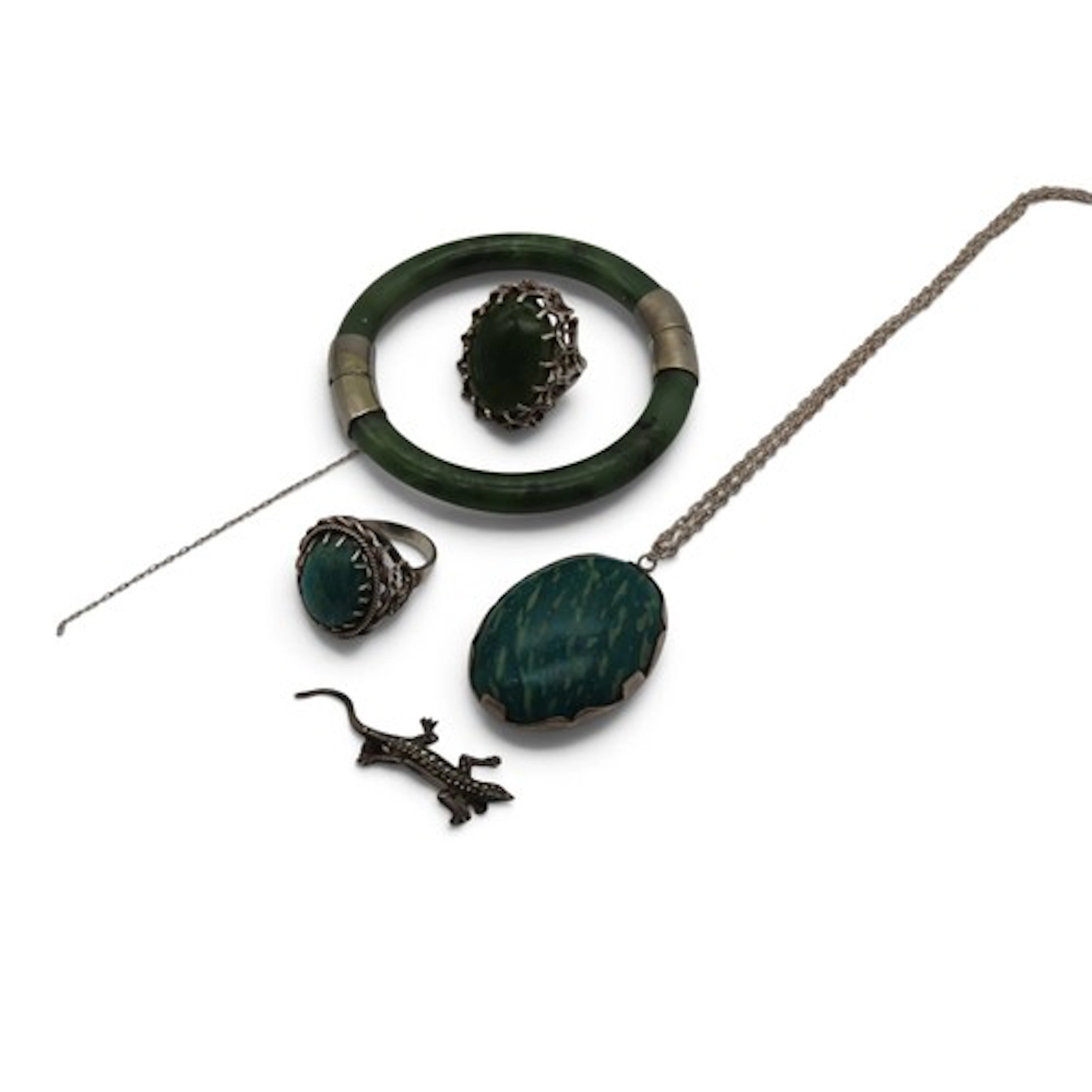 A 20th century spinach jade hinged bangle, together with a m...