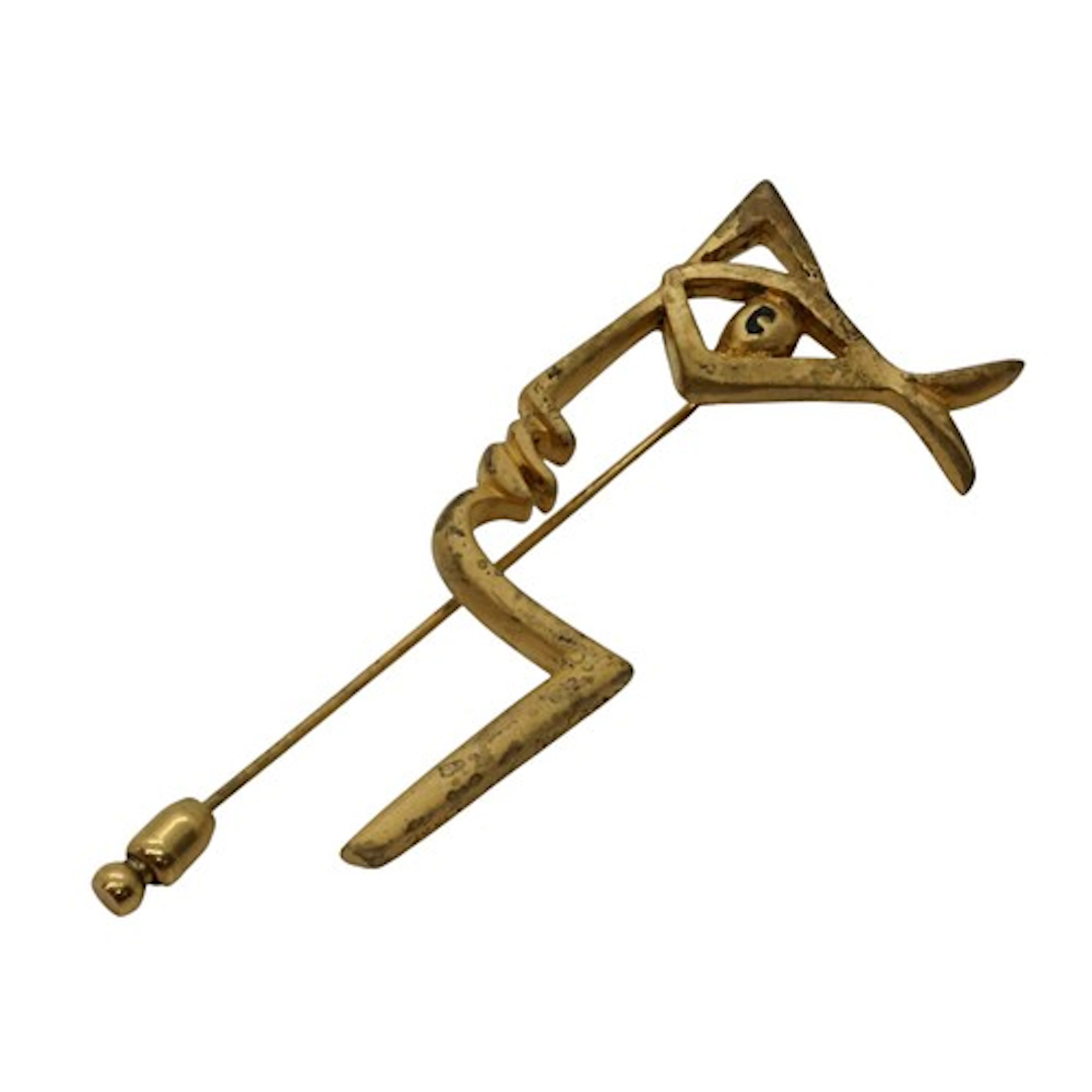 A vintage Jean Cocteau modernist face stick pin, artist desi...