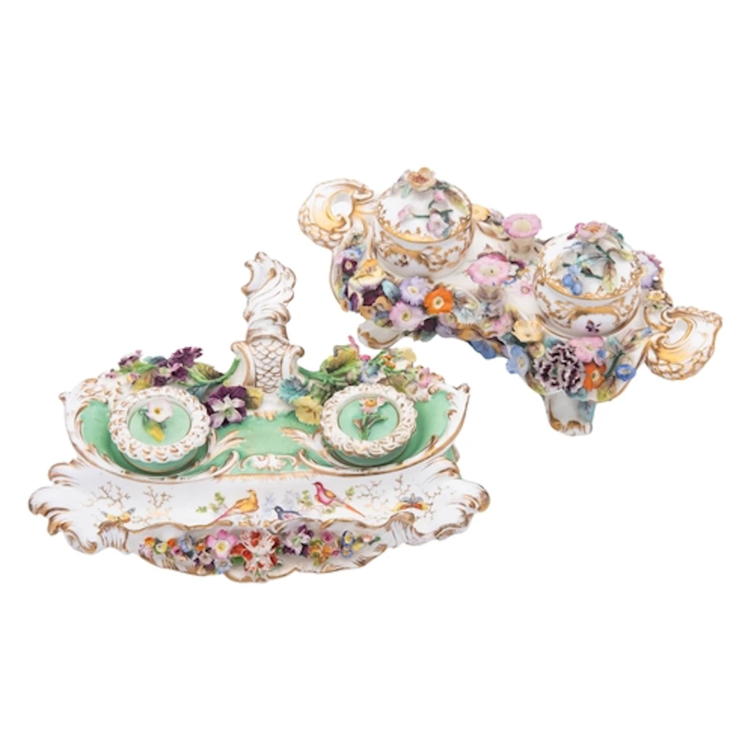 A Coalport flower-encrusted inkstand and a similar green-gro...