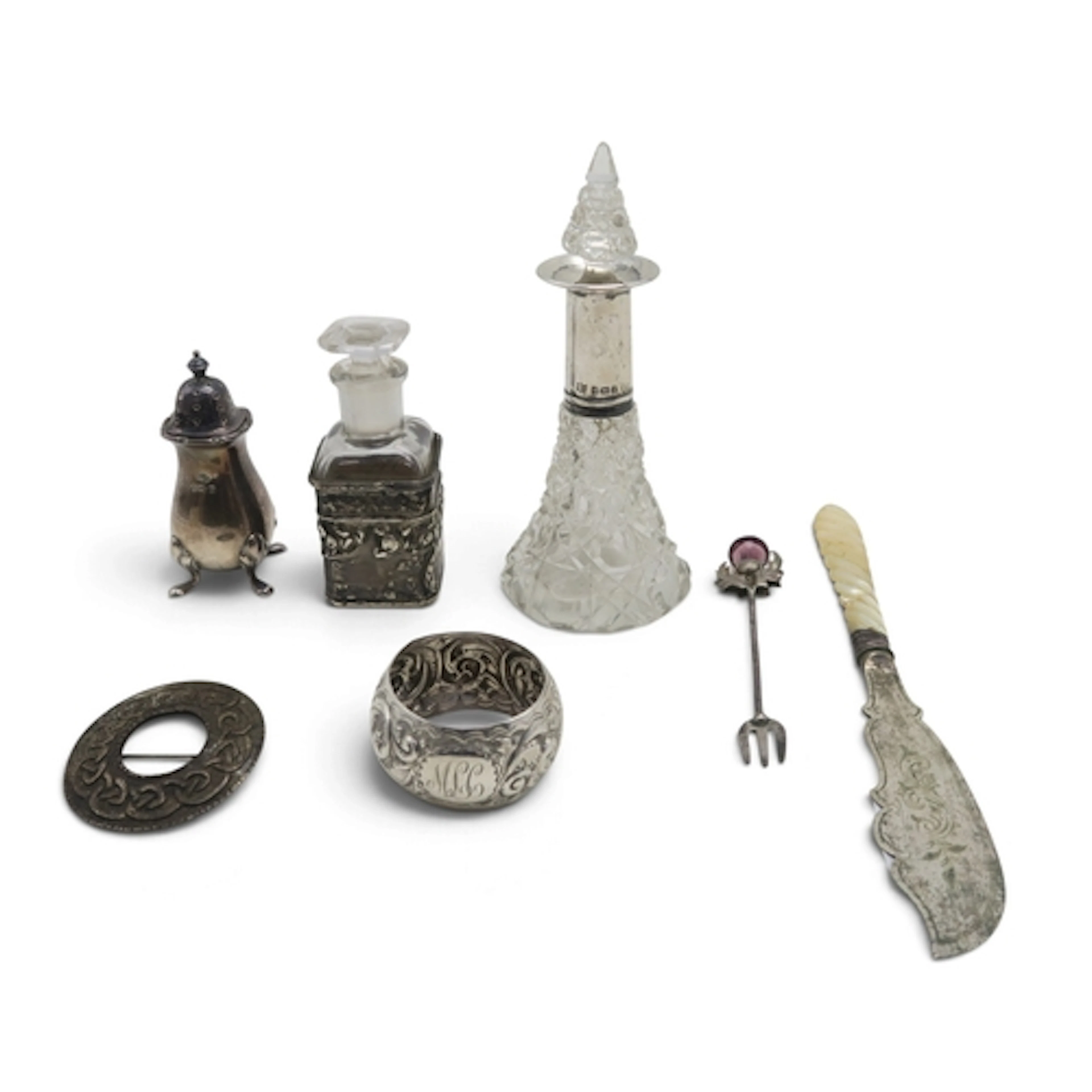 A collection of Victorian and later silver, to include a nap...