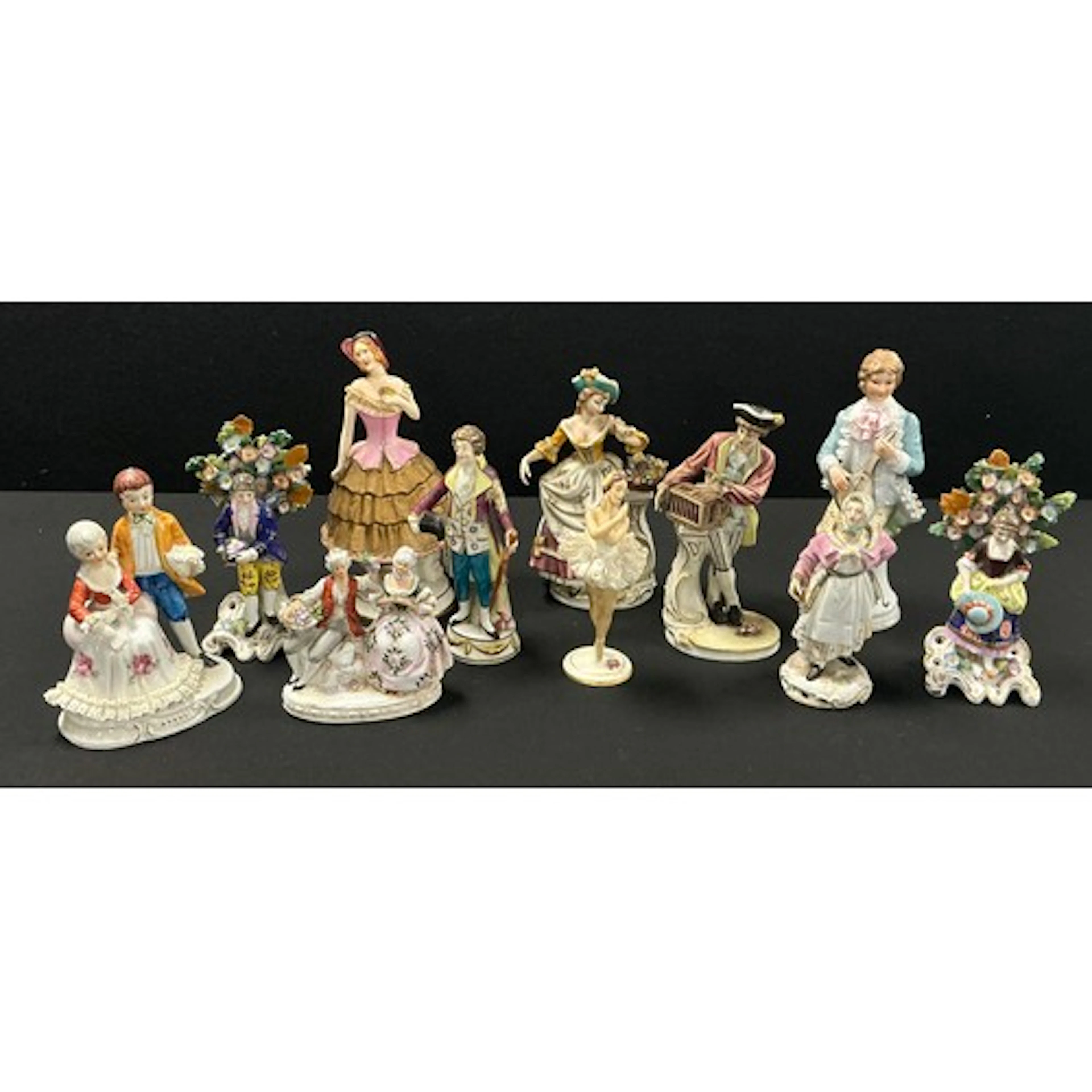 A continental porcelain figure as a street vendor dressed in...