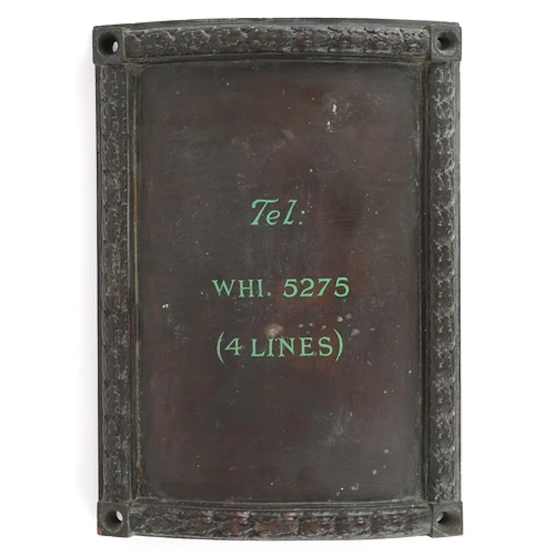 Early 20th century curved bronze pillar plate decorated with...