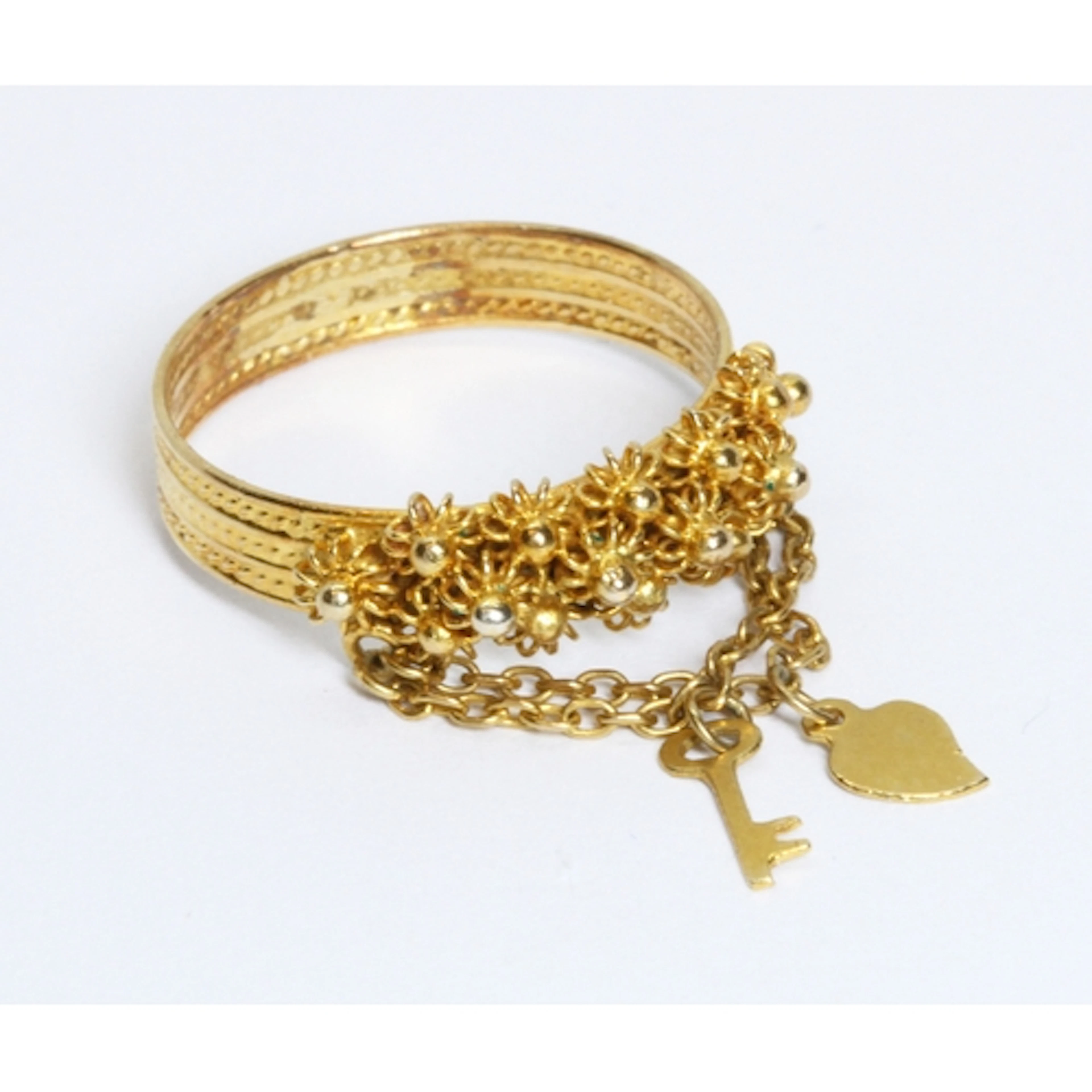 A traditional Sardinian wedding ring fede sarda, with filigr...