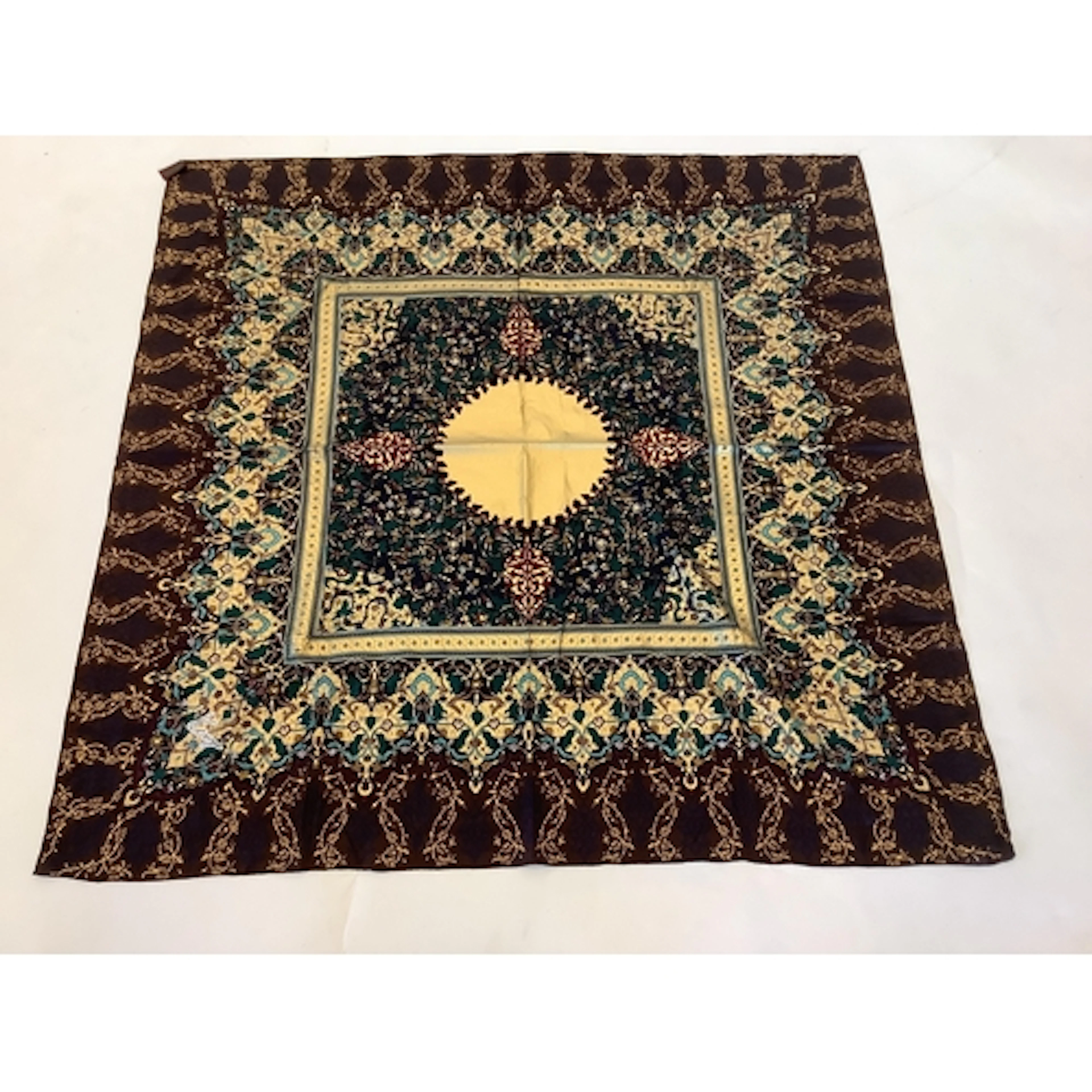 A Kenzo multi coloured and gold printed silk scarf, with la...