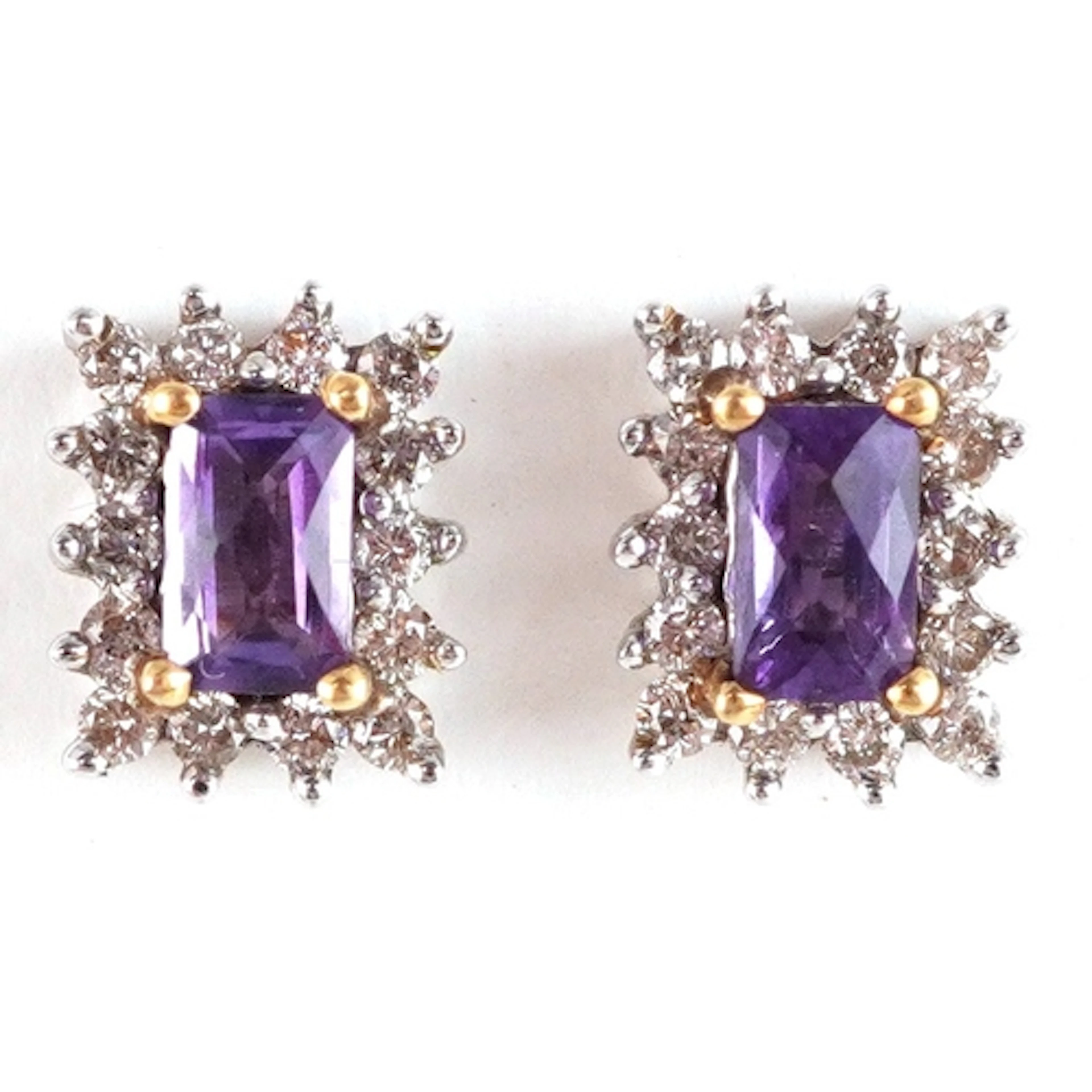 Pair of 10K gold amethyst and diamond stud earrings, 8.8mm h...