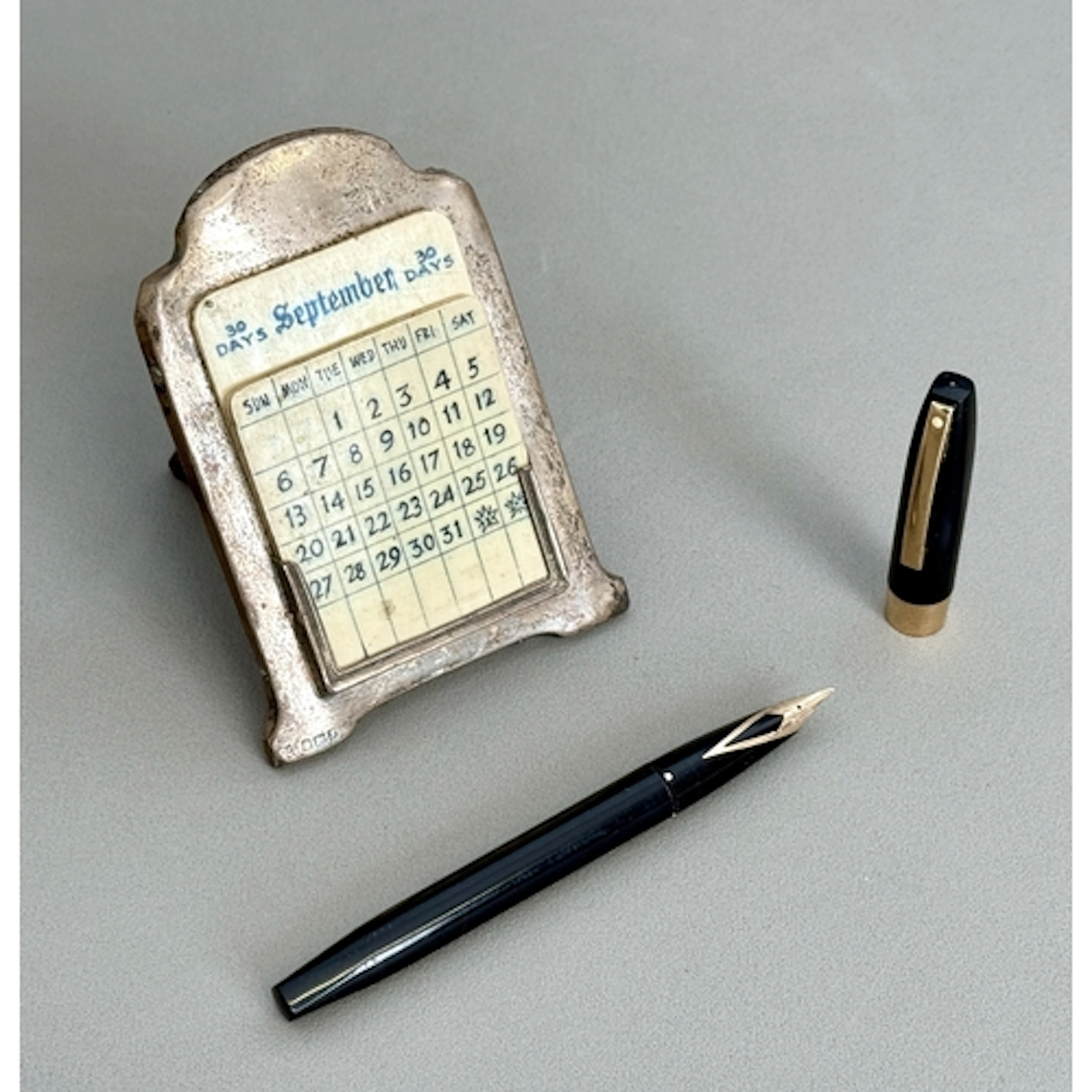 An Edwardian silver perpetual calendar - hallmarked John Dea...
