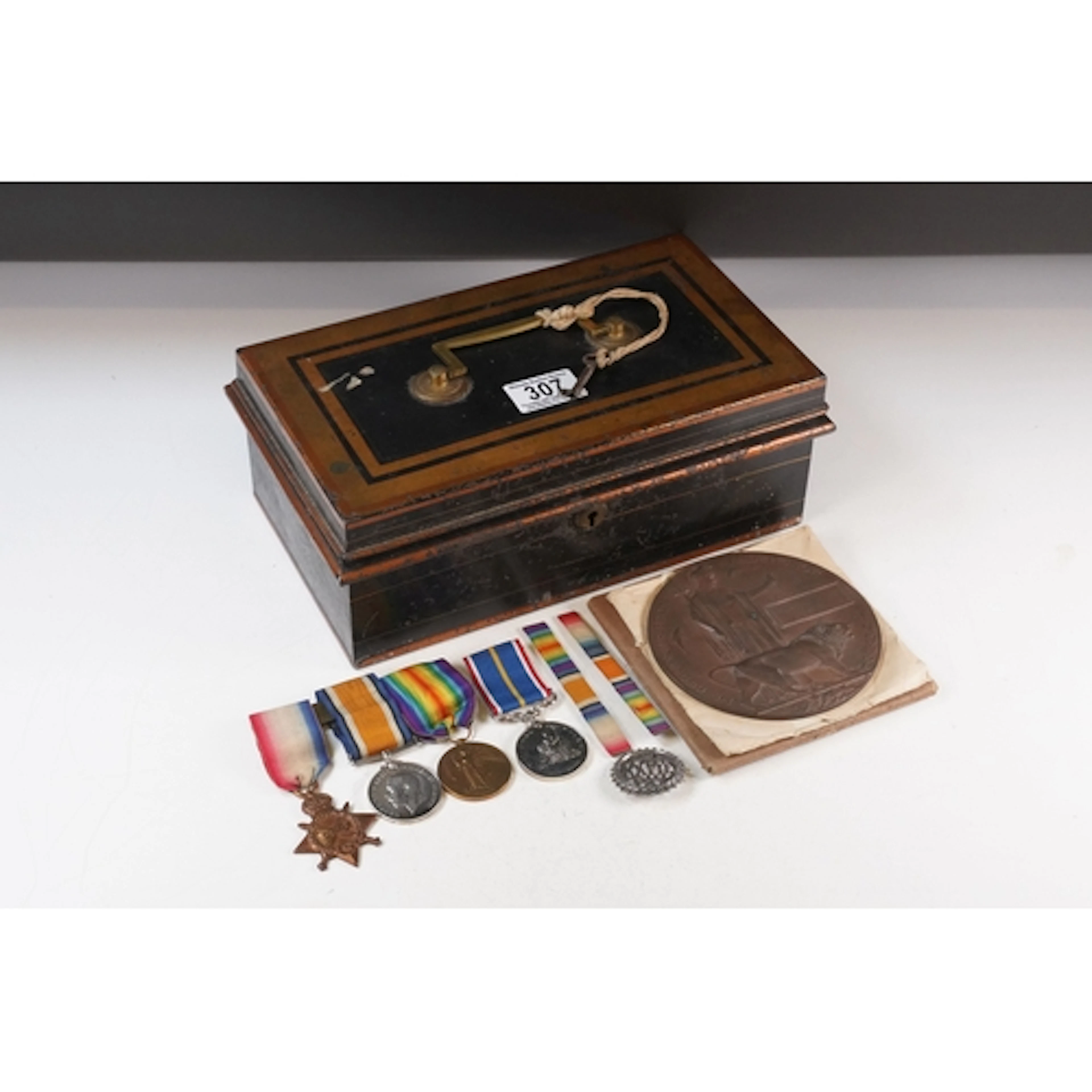 A British World War One full size medal trio comprising of t...