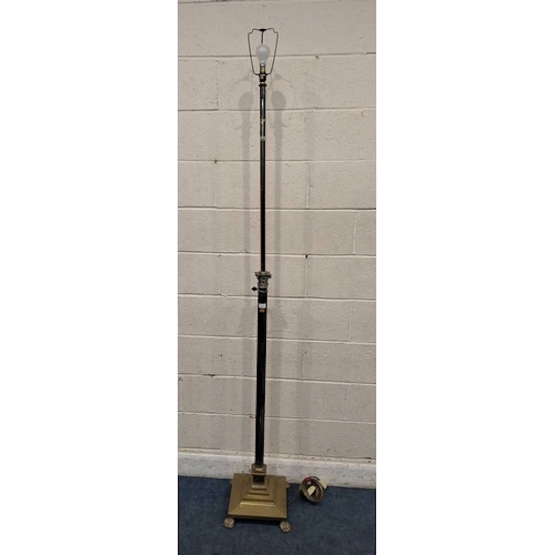 A BRASS TELESCOPIC STANDARD LAMP, with a corinthian style su...