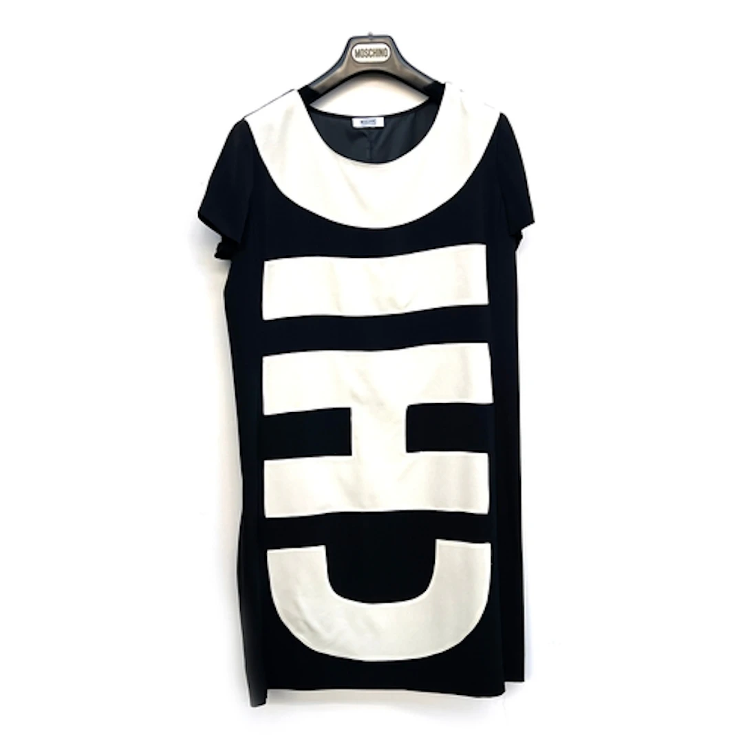A Moschino 'CHIC' pattern black and white silk short sleeved...