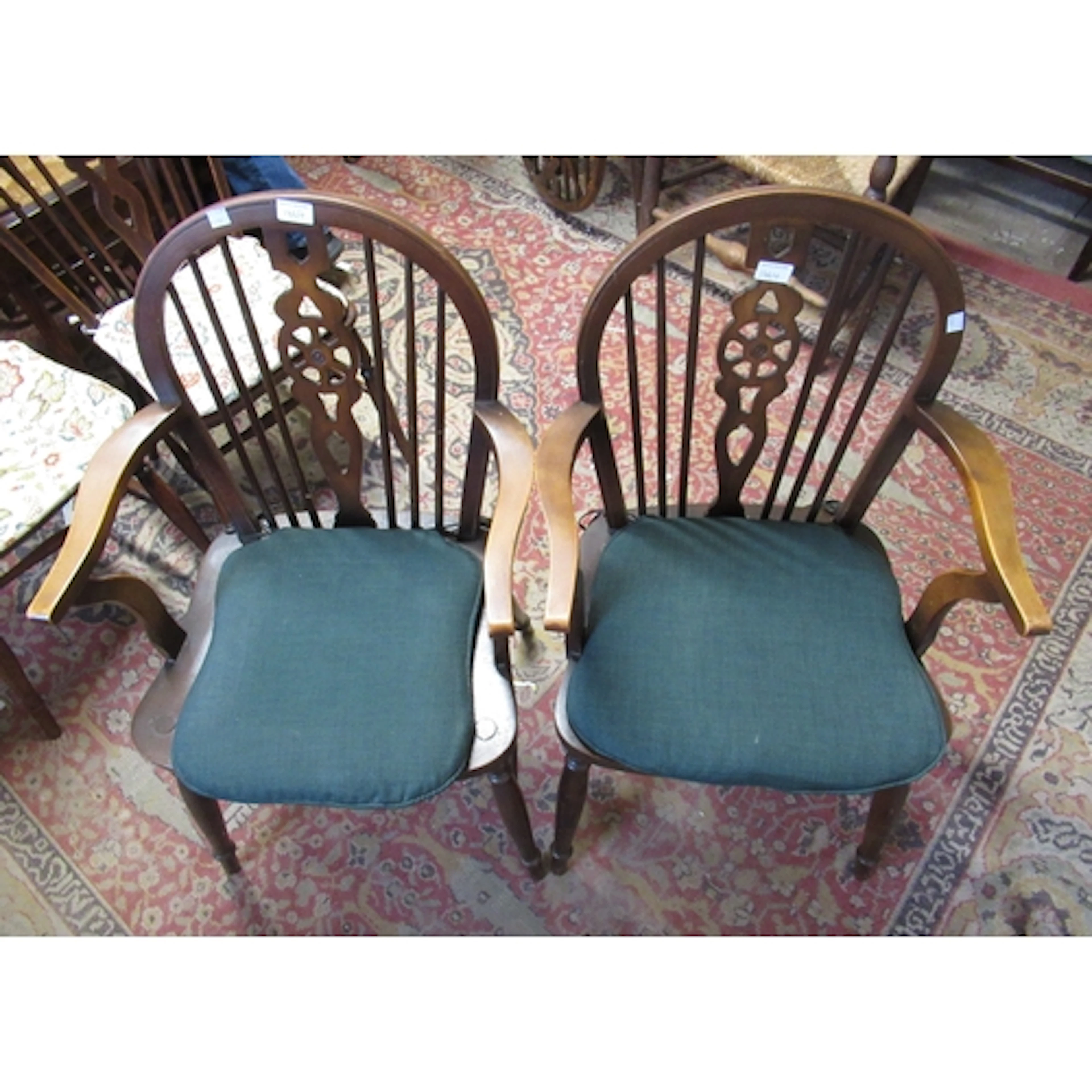 Edwardian walnut nursing chair, a pair of wheel back elbow c...