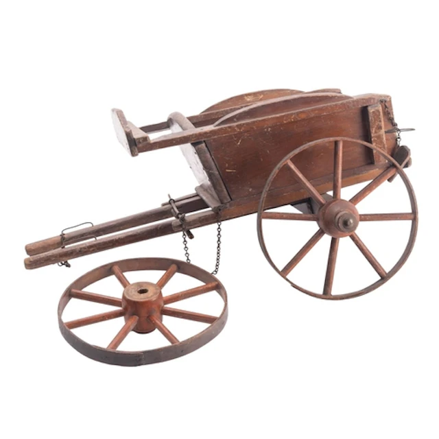 An early 20th century wooden toy hay cart stamped 'H. Tomps...