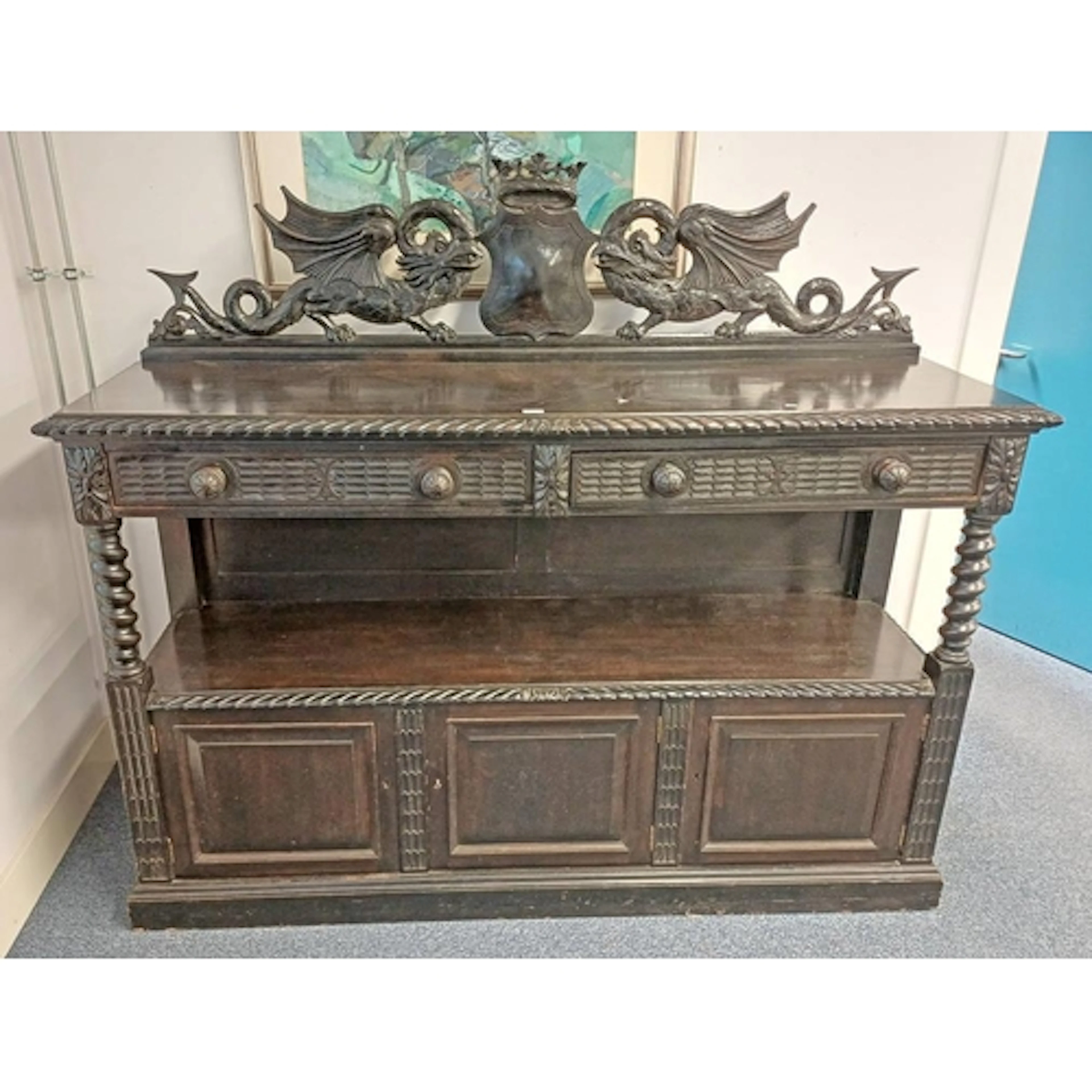 JACOBIAN REVIVAL DARK OAK BUFFET. THE CARVED BACK WITH CREST...
