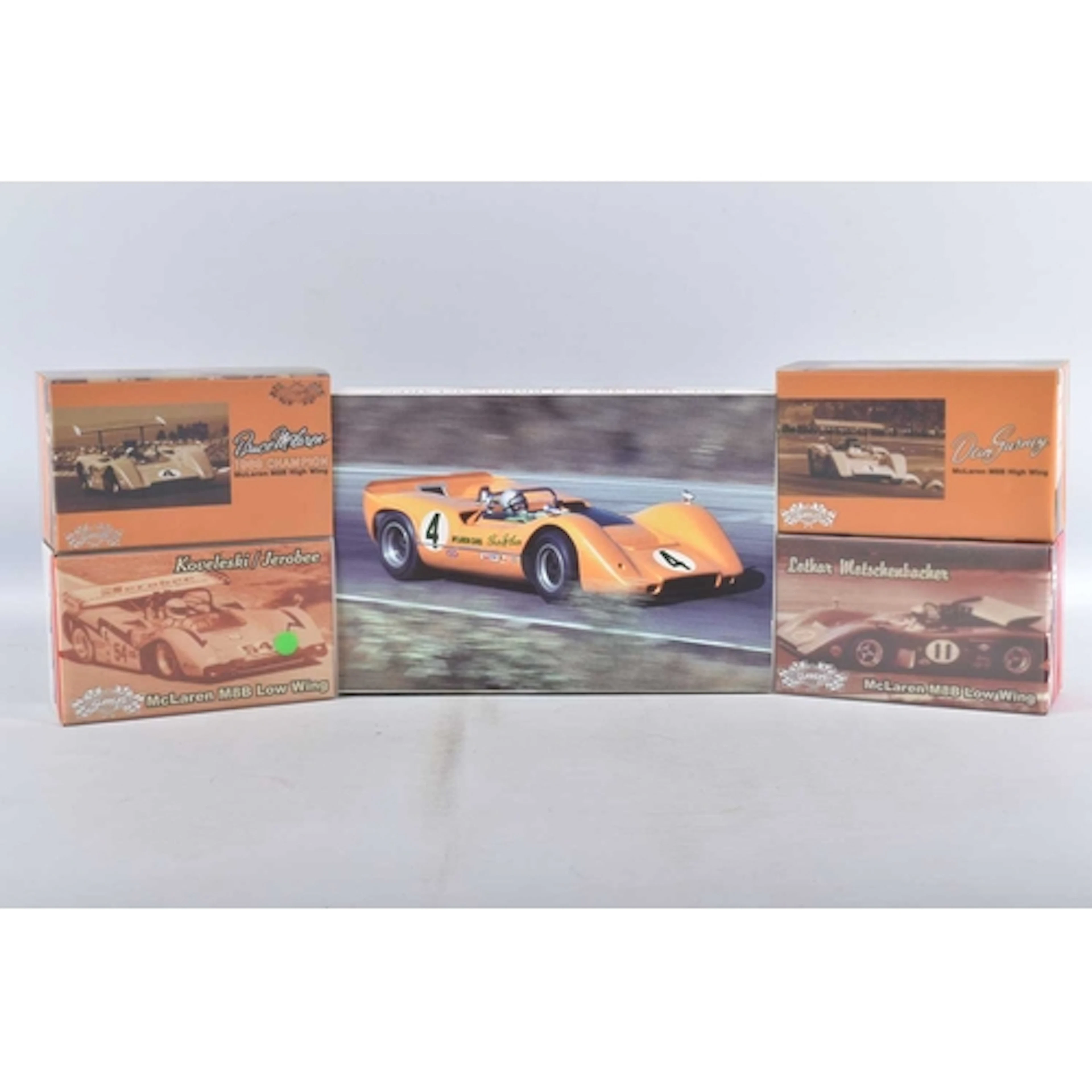 FOUR BOXED GMP 1:43 RACING CAR MODEL VEHICLES, to include a ...