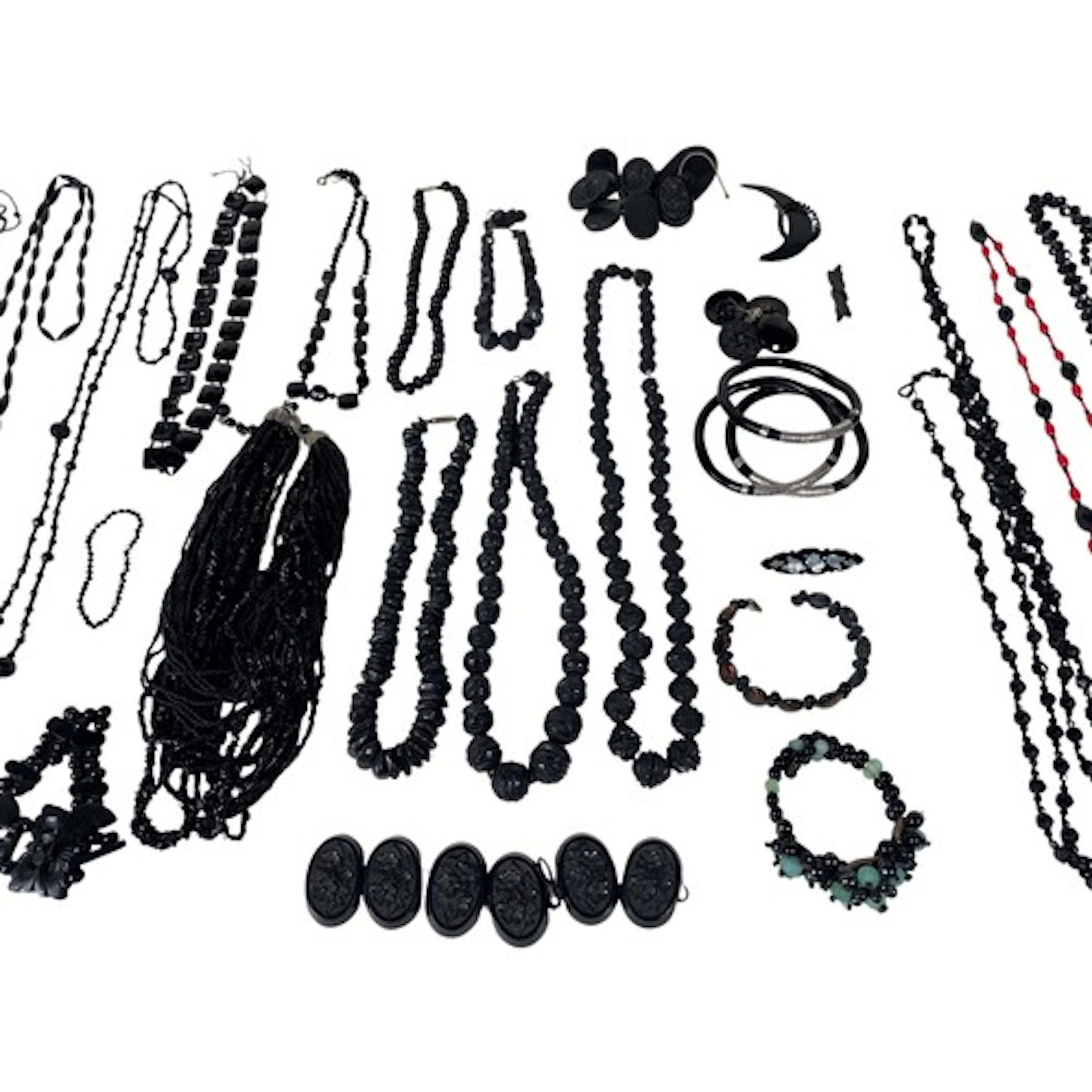 A collection of costume jewellery, mostly black bed and jet ...