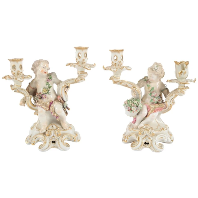 A pair of Chelsea twin branch figural candelabra, circa 1765...