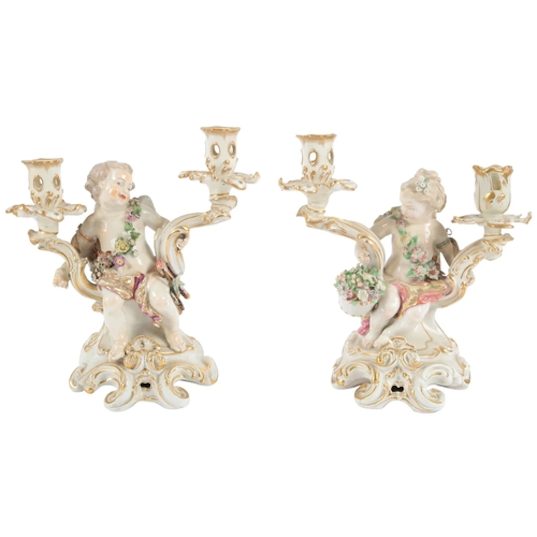 A pair of Chelsea twin branch figural candelabra, circa 1765...