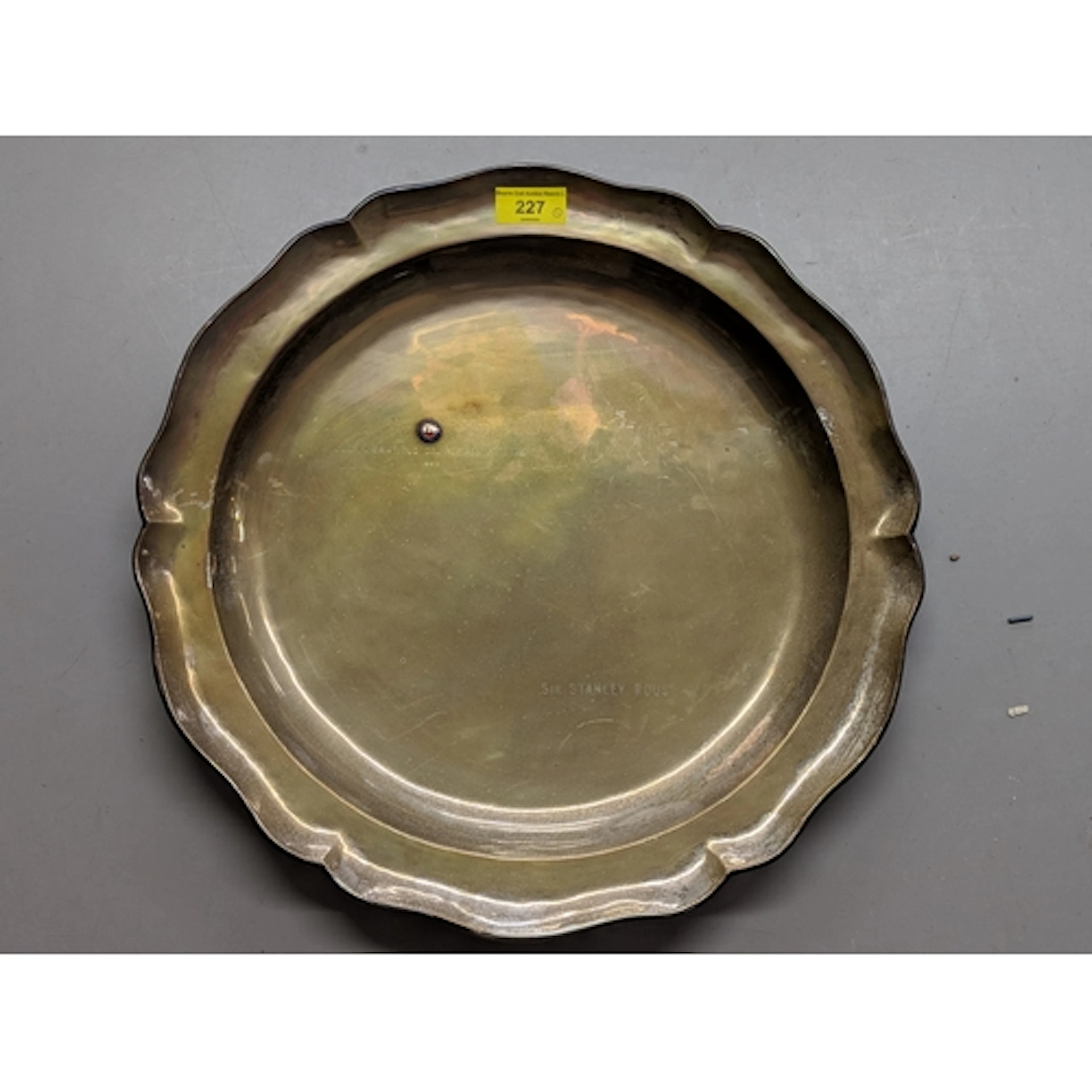 A silver plated charger presented to Sir Stanley Rous from t...
