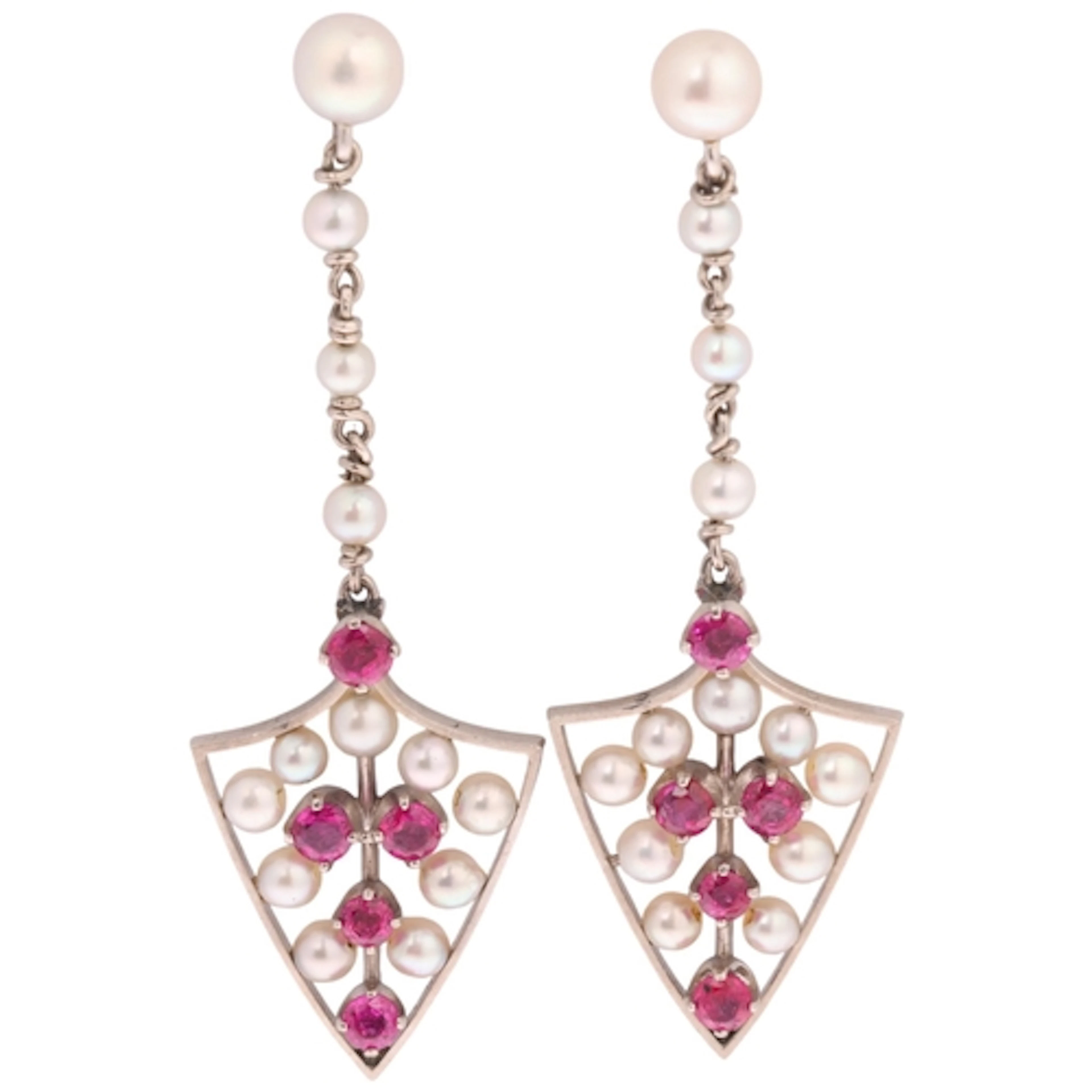 A pair of palladium ruby and pearl shield drop stud earrings...