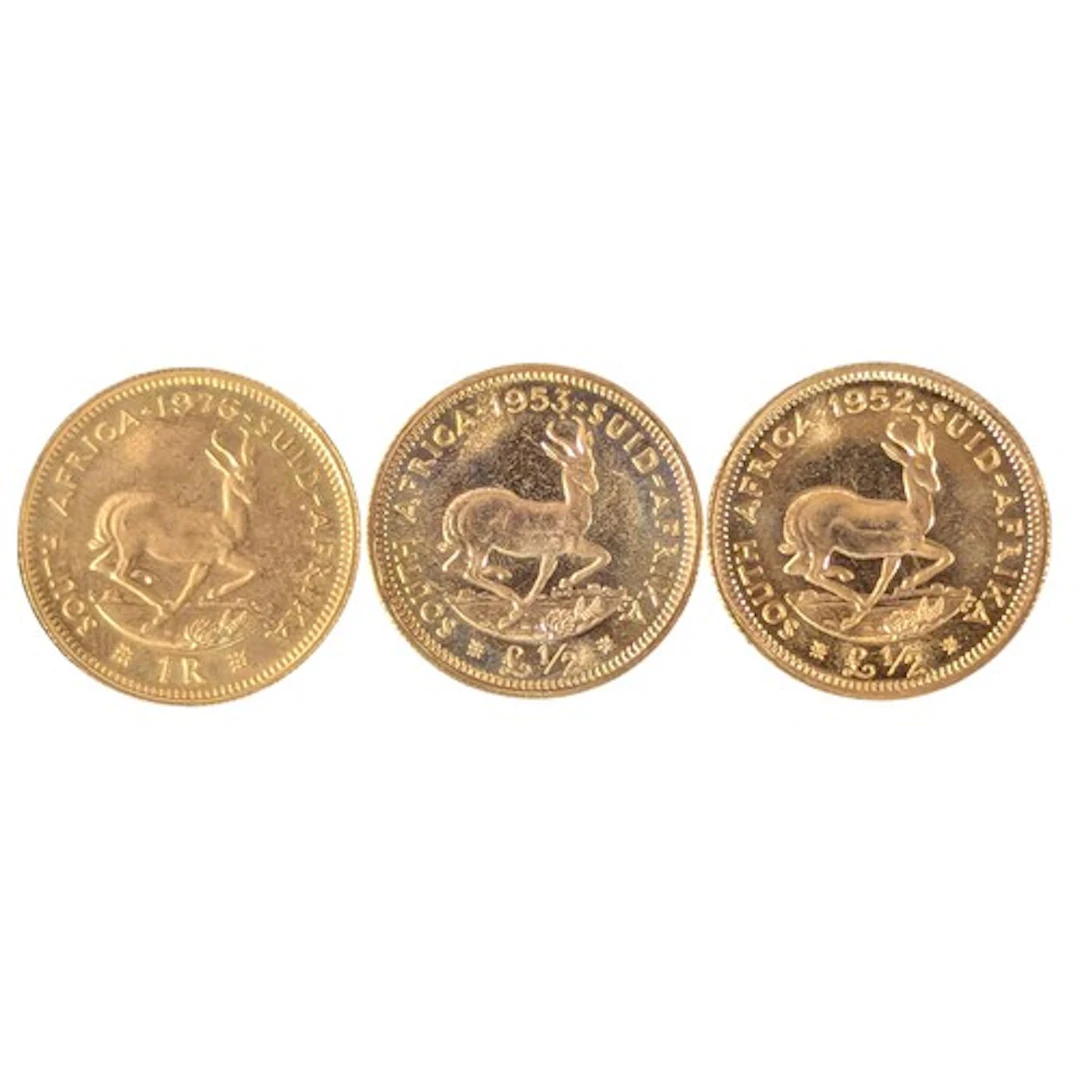 A South Africa 1 Rand gold coin dated 1976; two George VI So...
