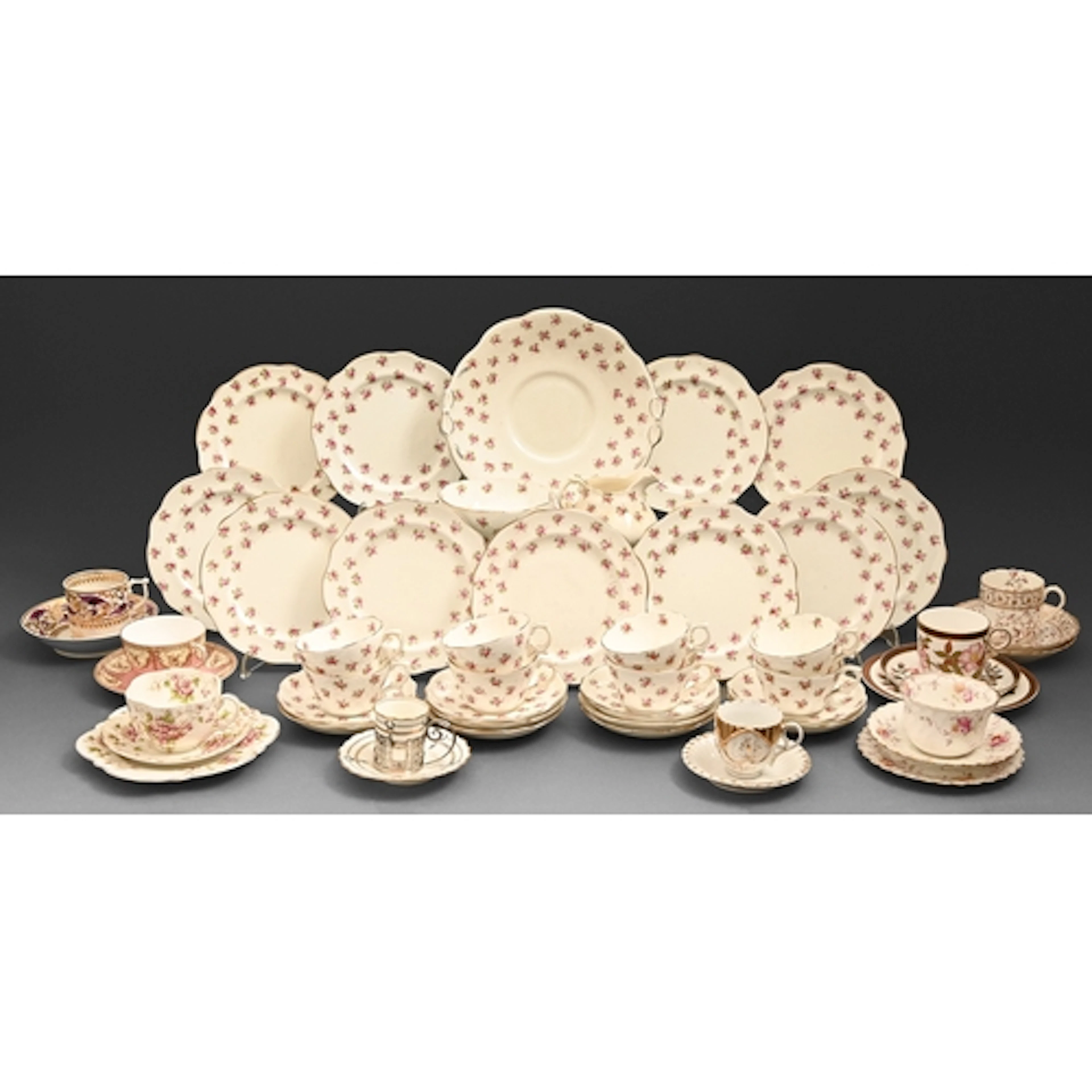 An Aynsley bone china coffee cup and saucer with pierced sil...