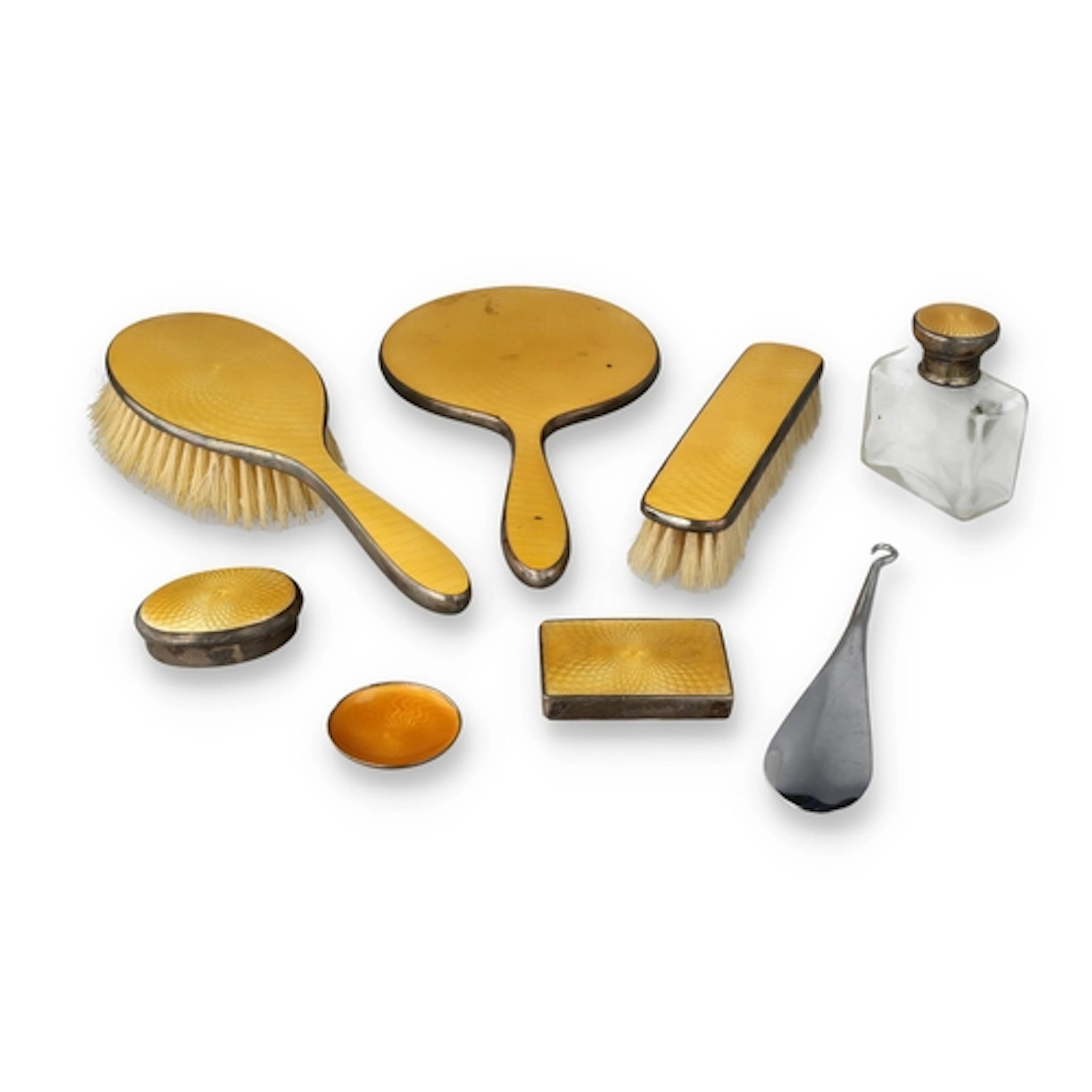 A SILVER AND YELLOW GUILLOCHE ENAMEL PART VANITY SET IN CASE...
