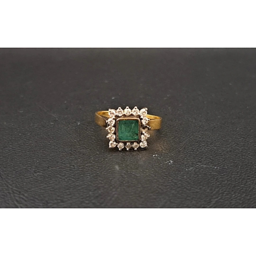 EMERALD AND DIAMOND CLUSTER the central square cut emerald ...