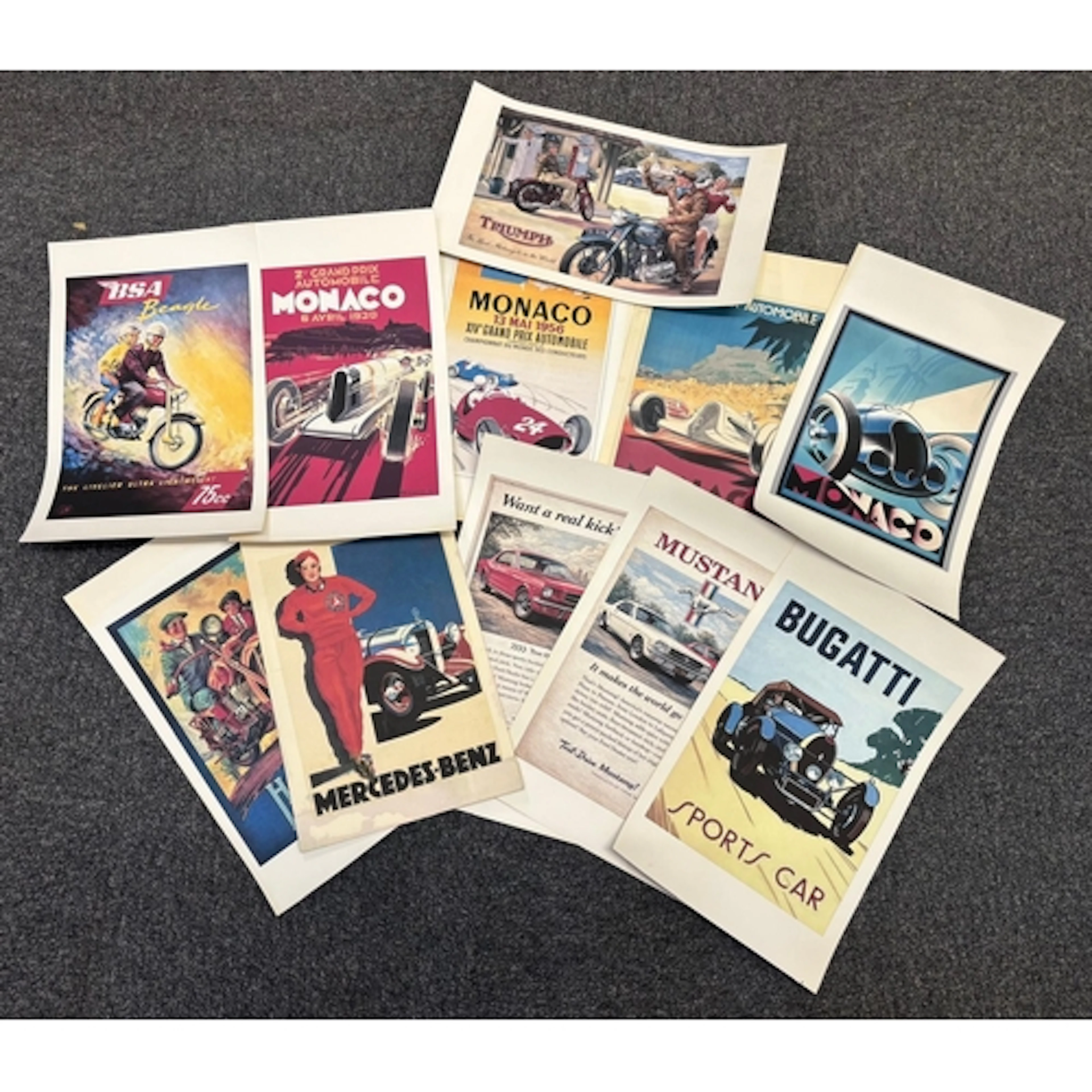 Collection of assorted reproduction automobilia type posters...