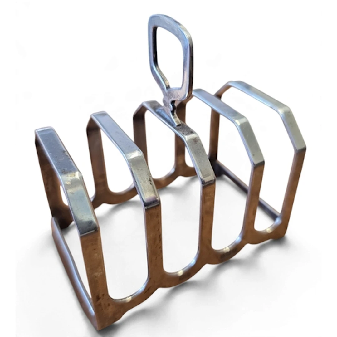 An Art Deco Silver toast Rack, Birmingham 1932 William Suckl...