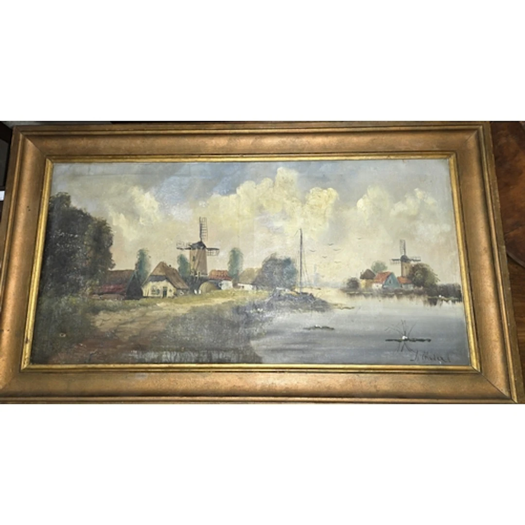 An early 20th century Dutch oil painting, with windmills by ...